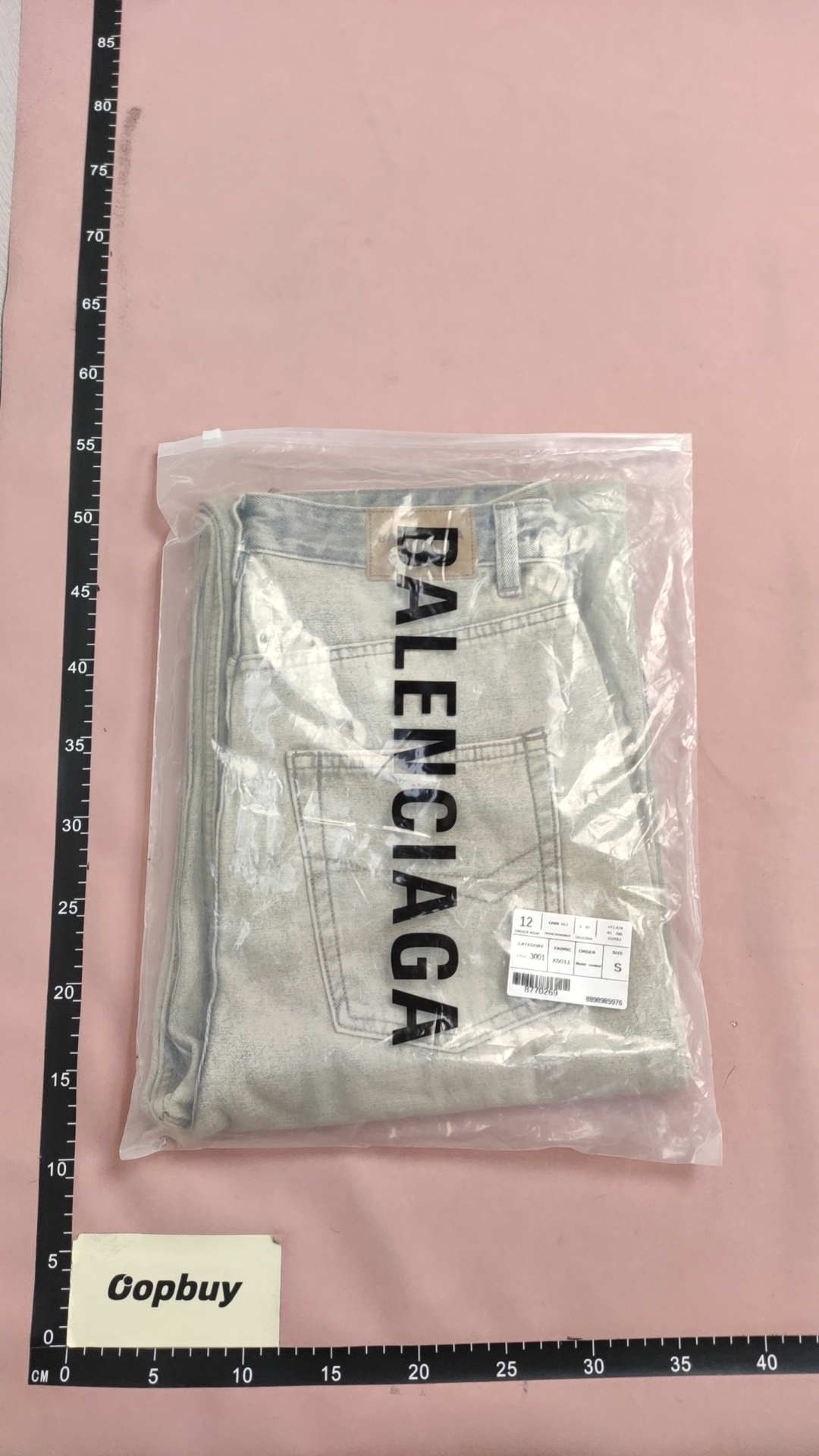 Balenciaga Light Wash Wide Leg Jeans with Side Zip Details