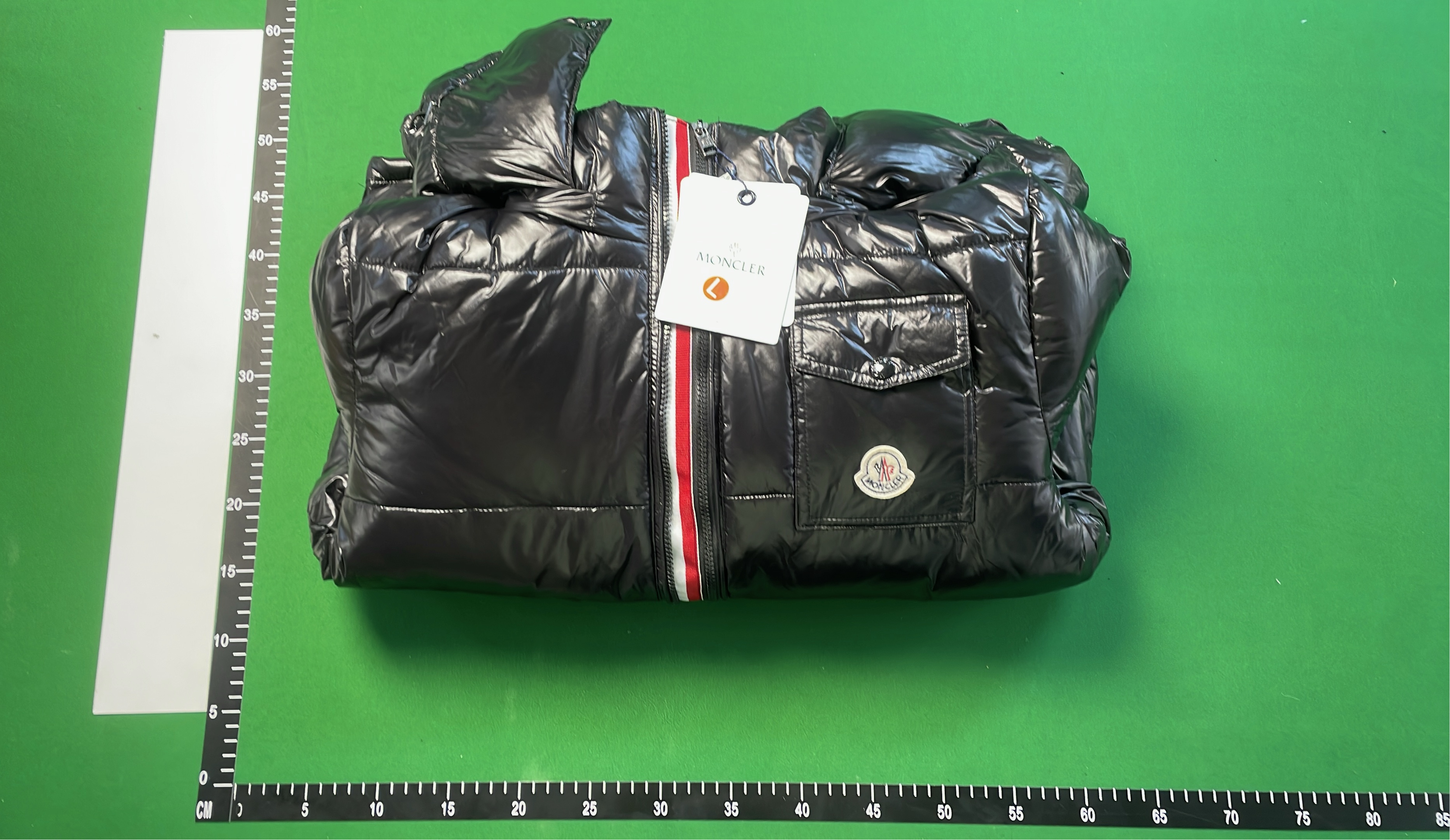 Black Down Jacket with Red and White Stripe Zipper