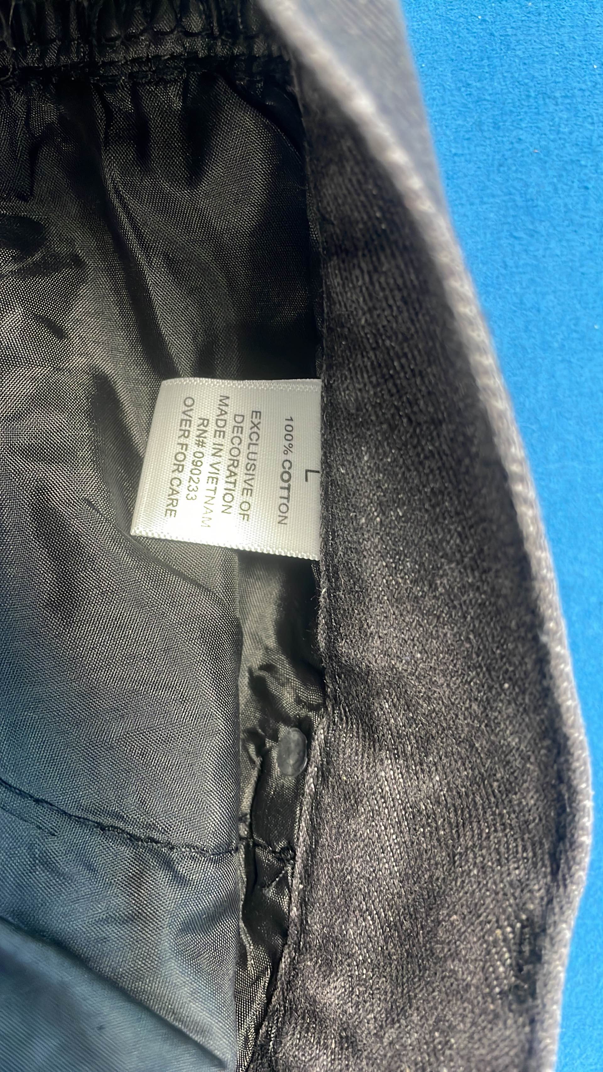 Black Distressed Denim Jeans with Embroidery and Frayed Hem