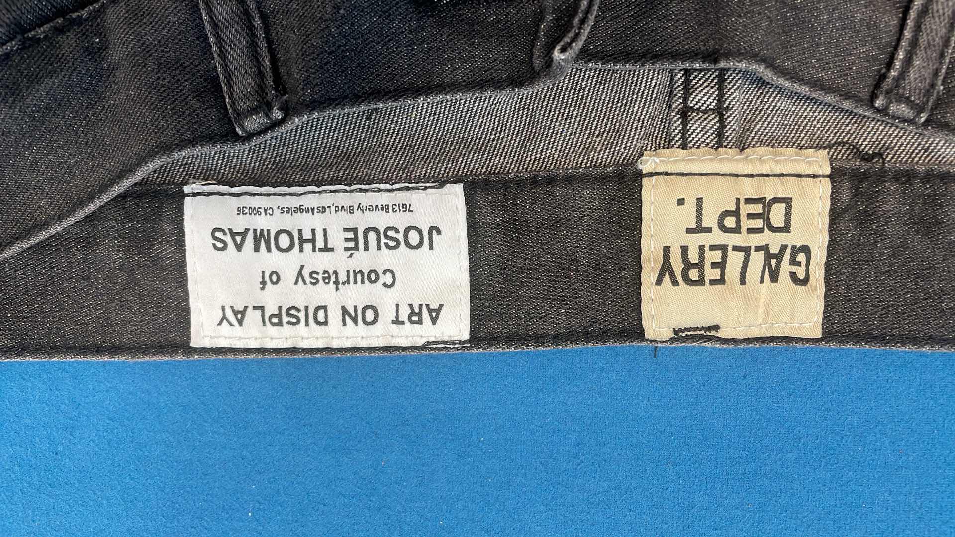 Black Distressed Denim Jeans with Embroidery and Frayed Hem