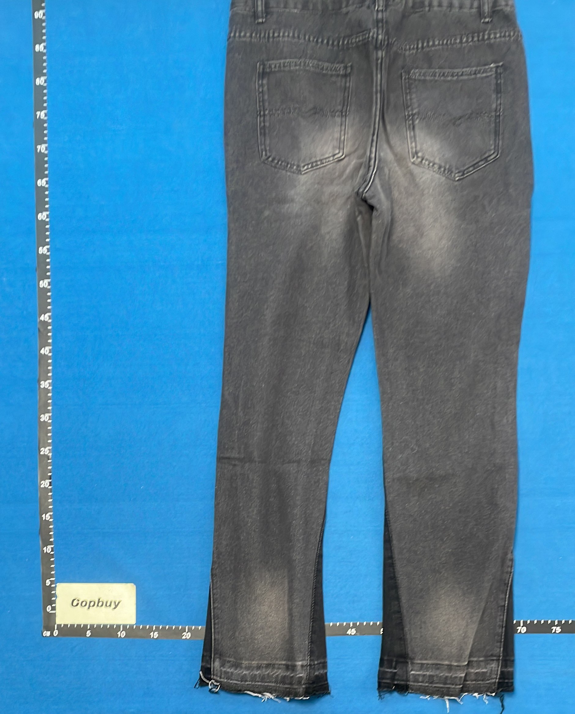 Black Distressed Denim Jeans with Embroidery and Frayed Hem