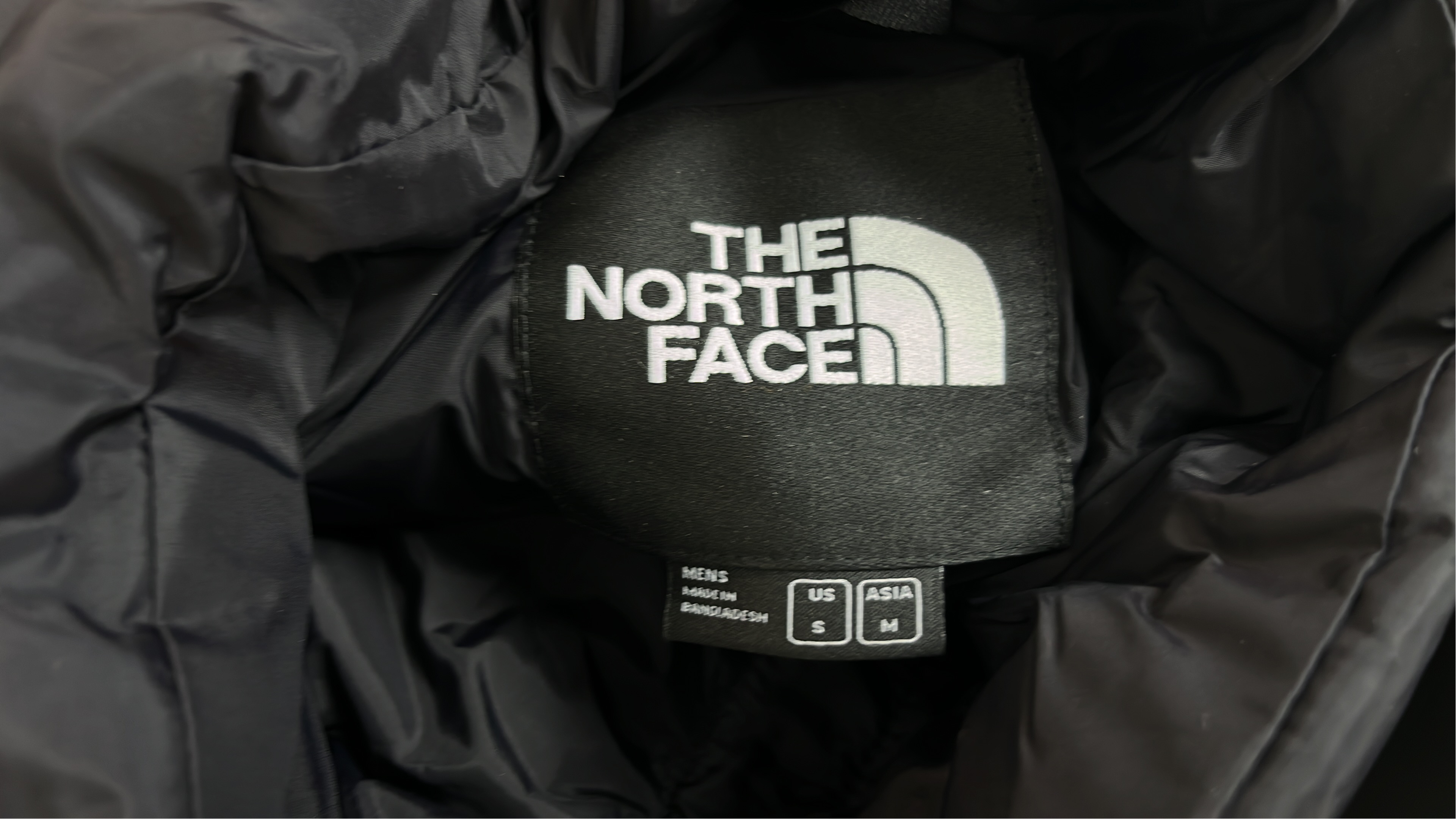 The North Face White Puffer Jacket with Black Panel