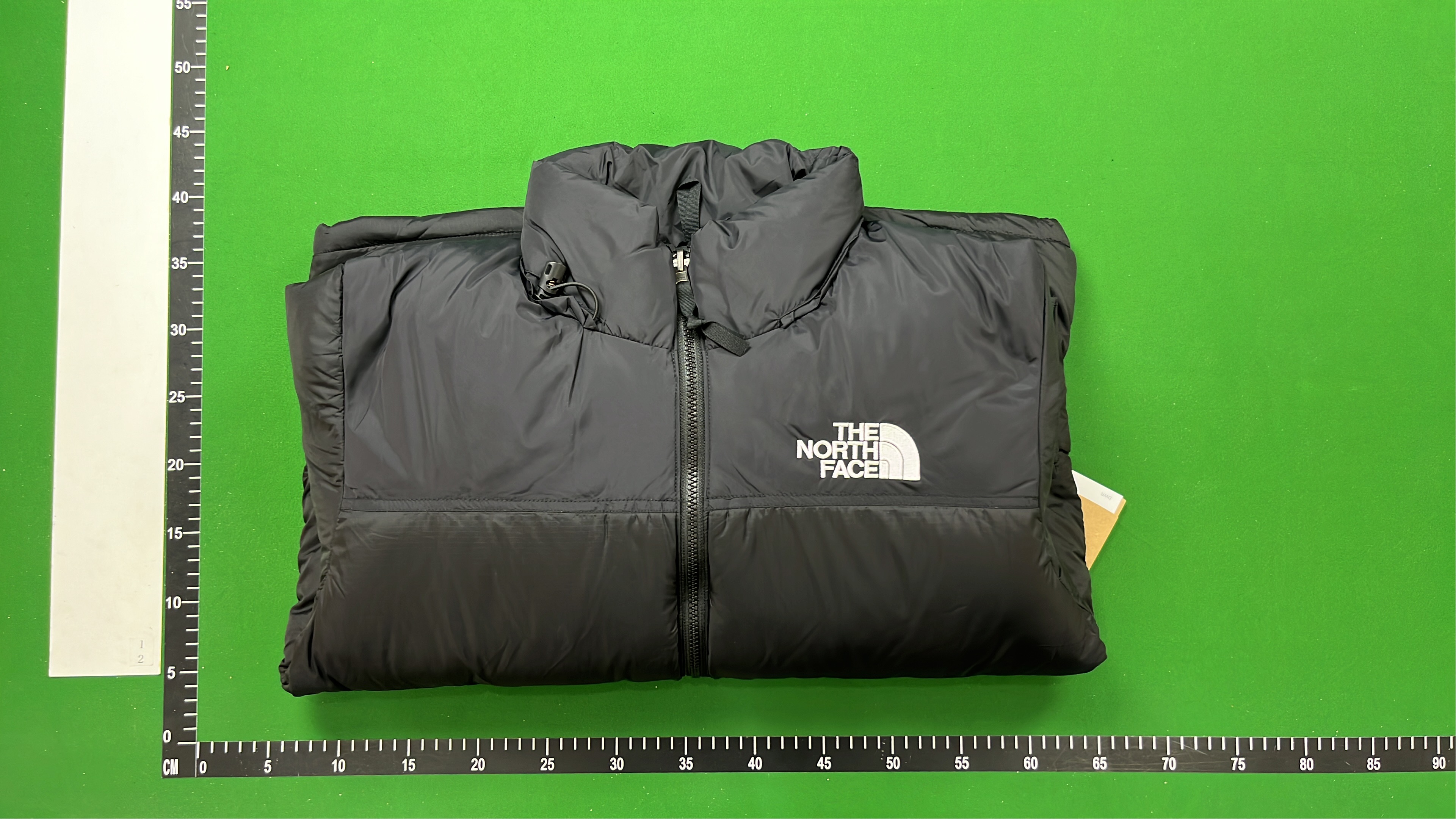 The North Face White Puffer Jacket with Black Panel