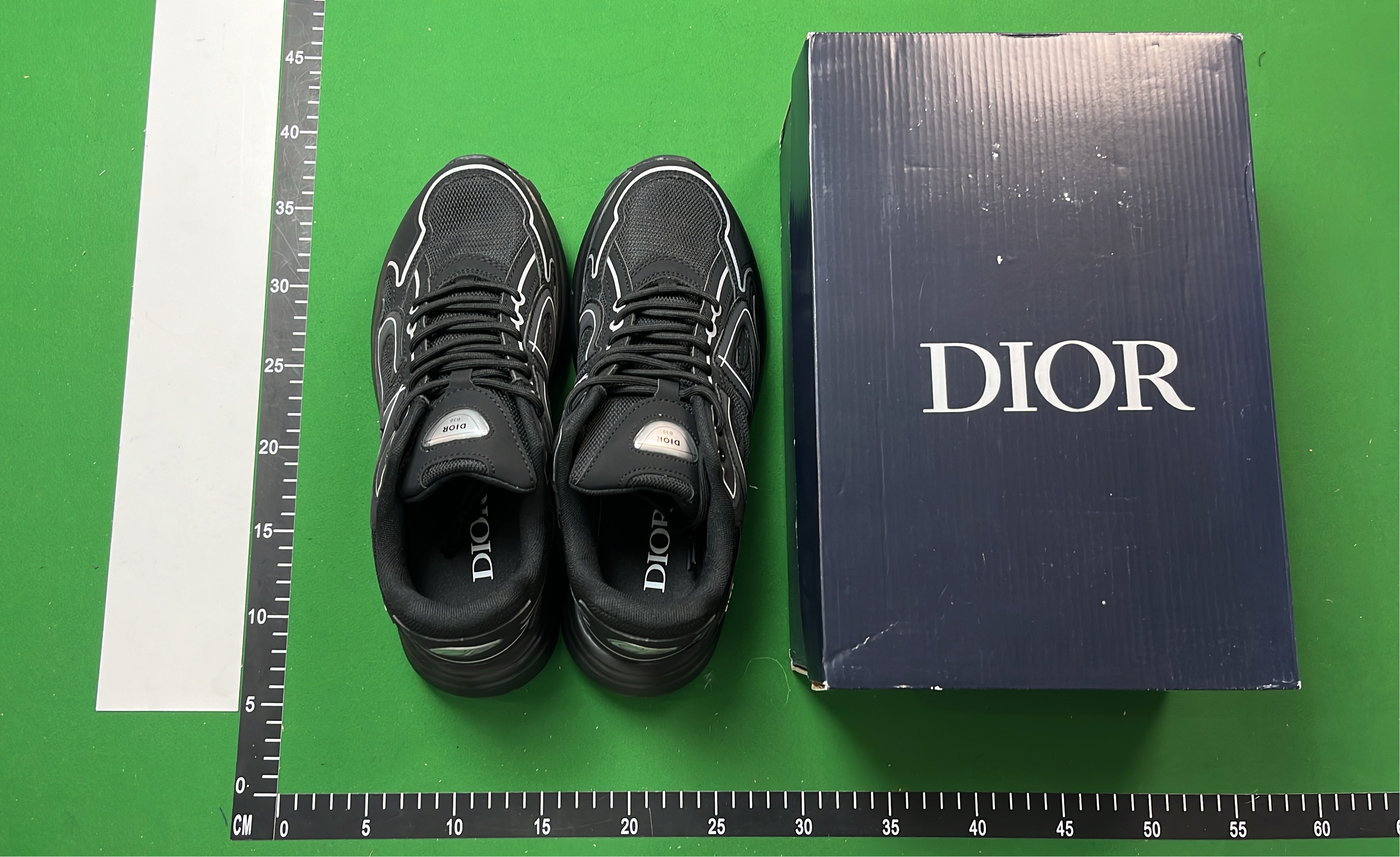Dior Black Sneakers with White Stitching and Logo Detail