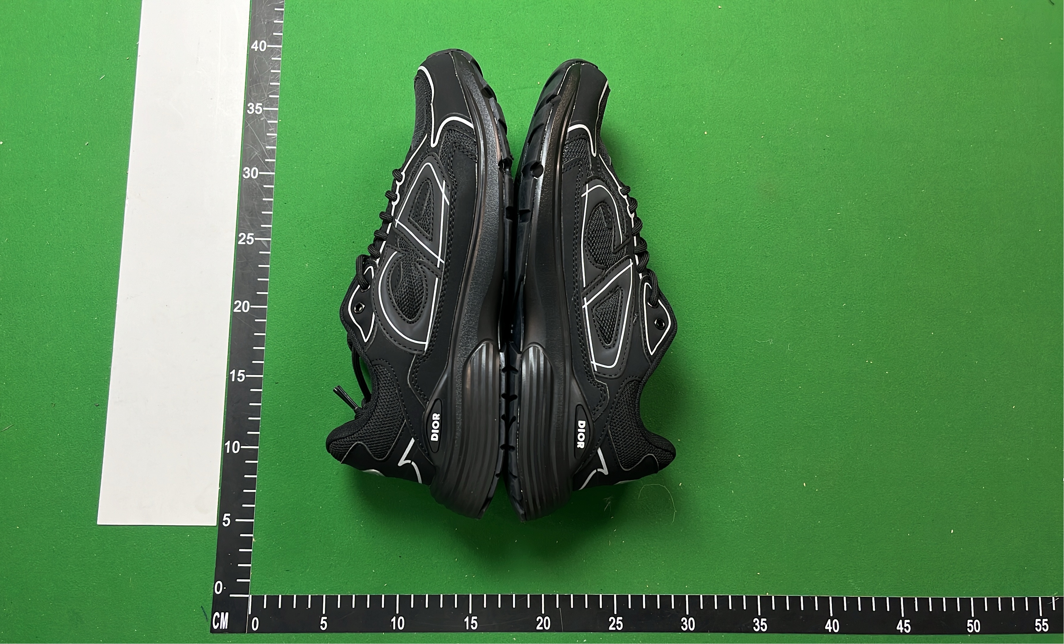 Dior Black Sneakers with White Stitching and Logo Detail