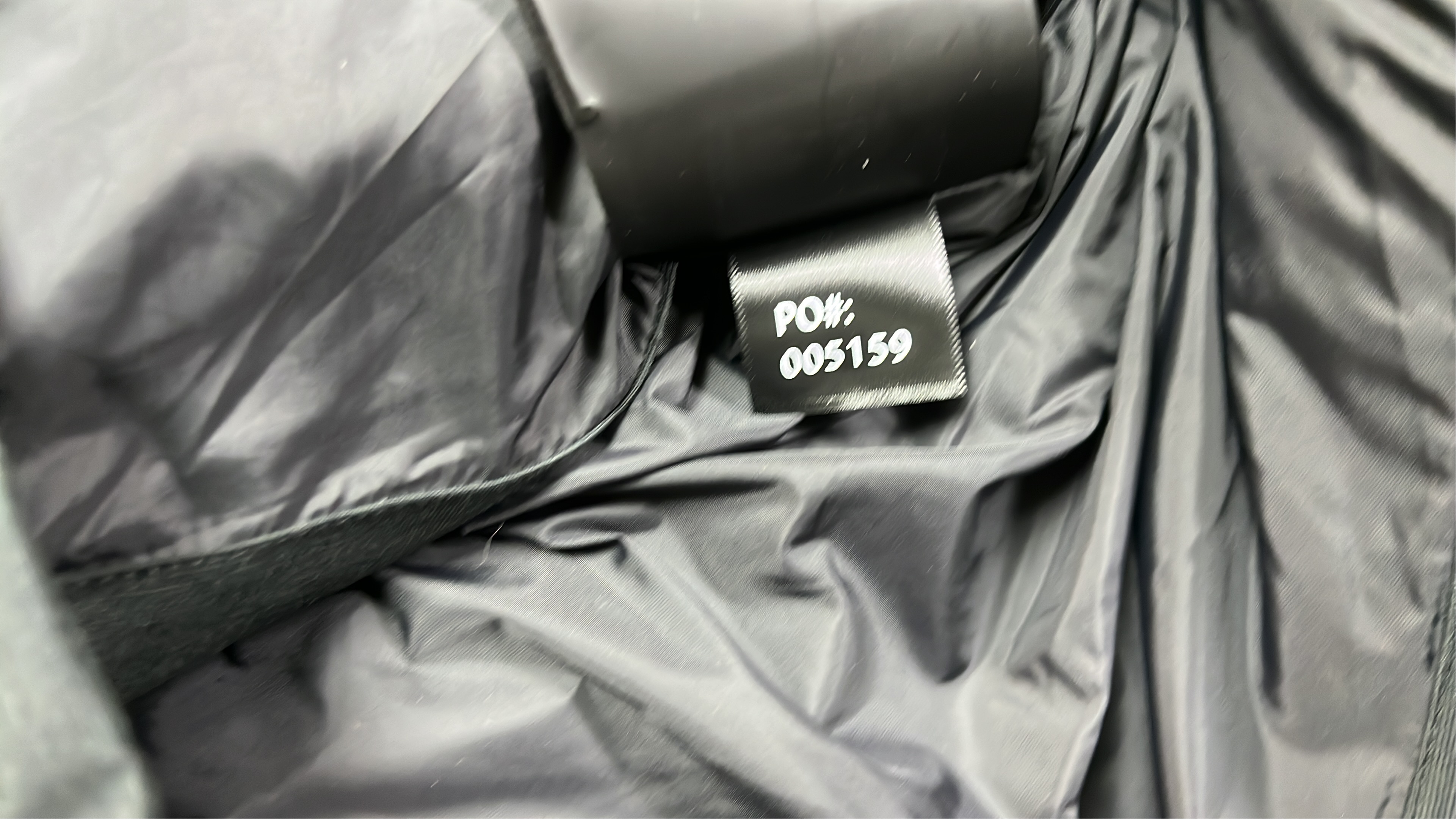 Black Puffer Jacket with Hood and Zippered Pockets