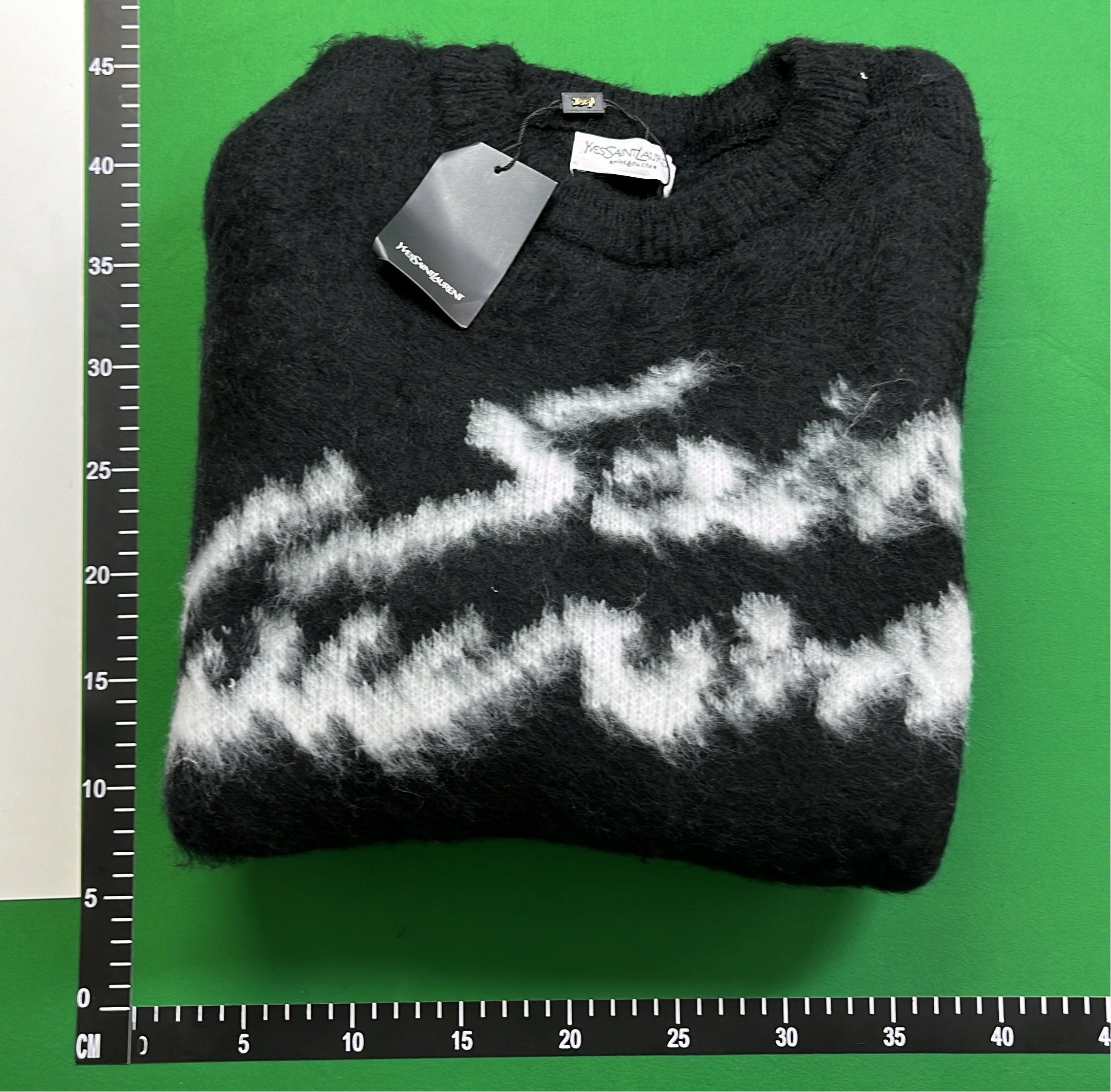 Black Knit Sweater with White Pattern Design