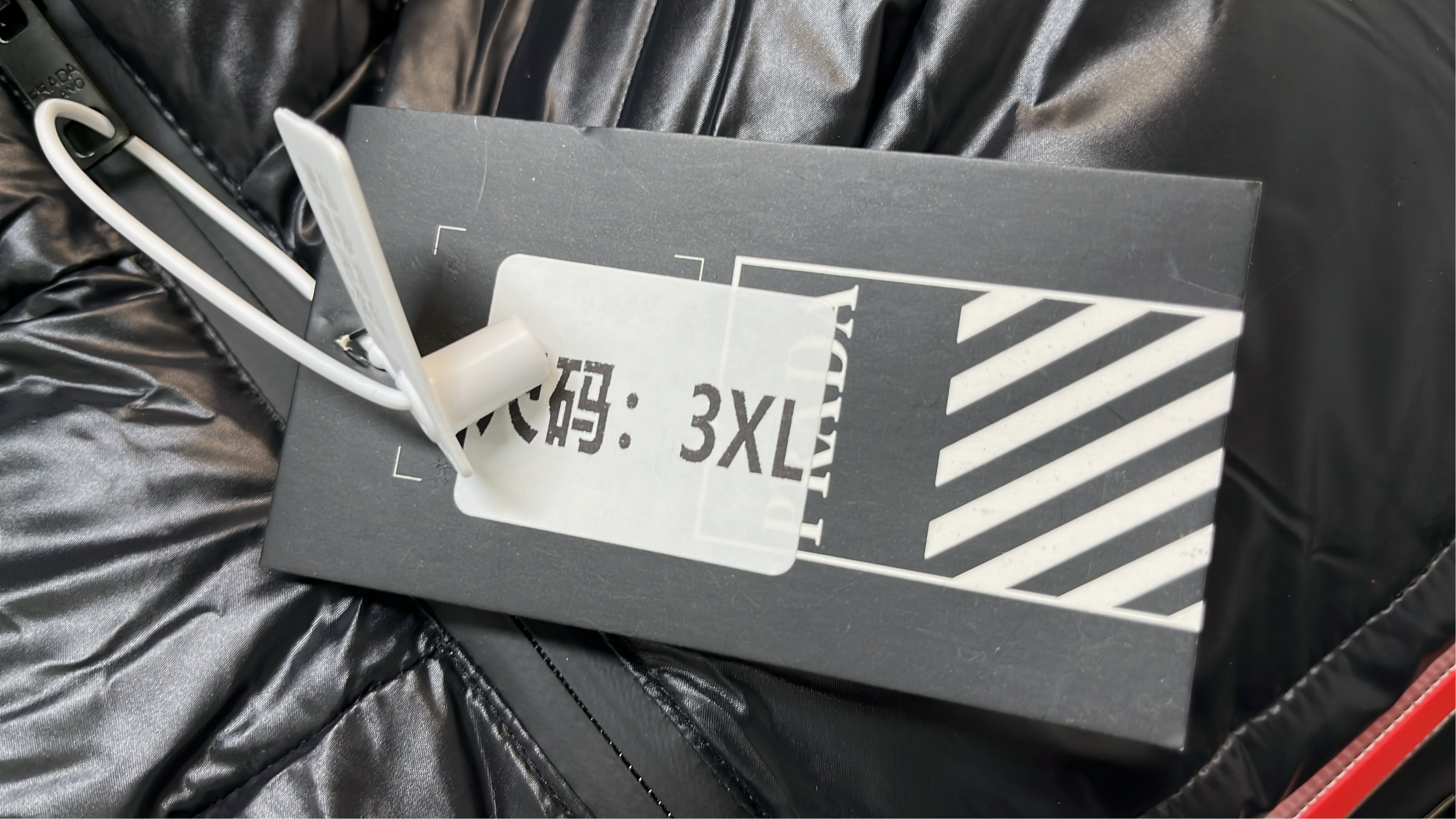 Prada Black Puffer Jacket with Hood and Logo Patch