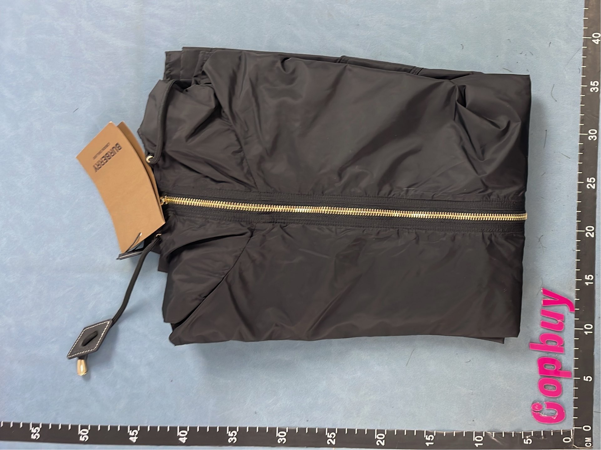 Black Hooded Rain Jacket with Check Lining