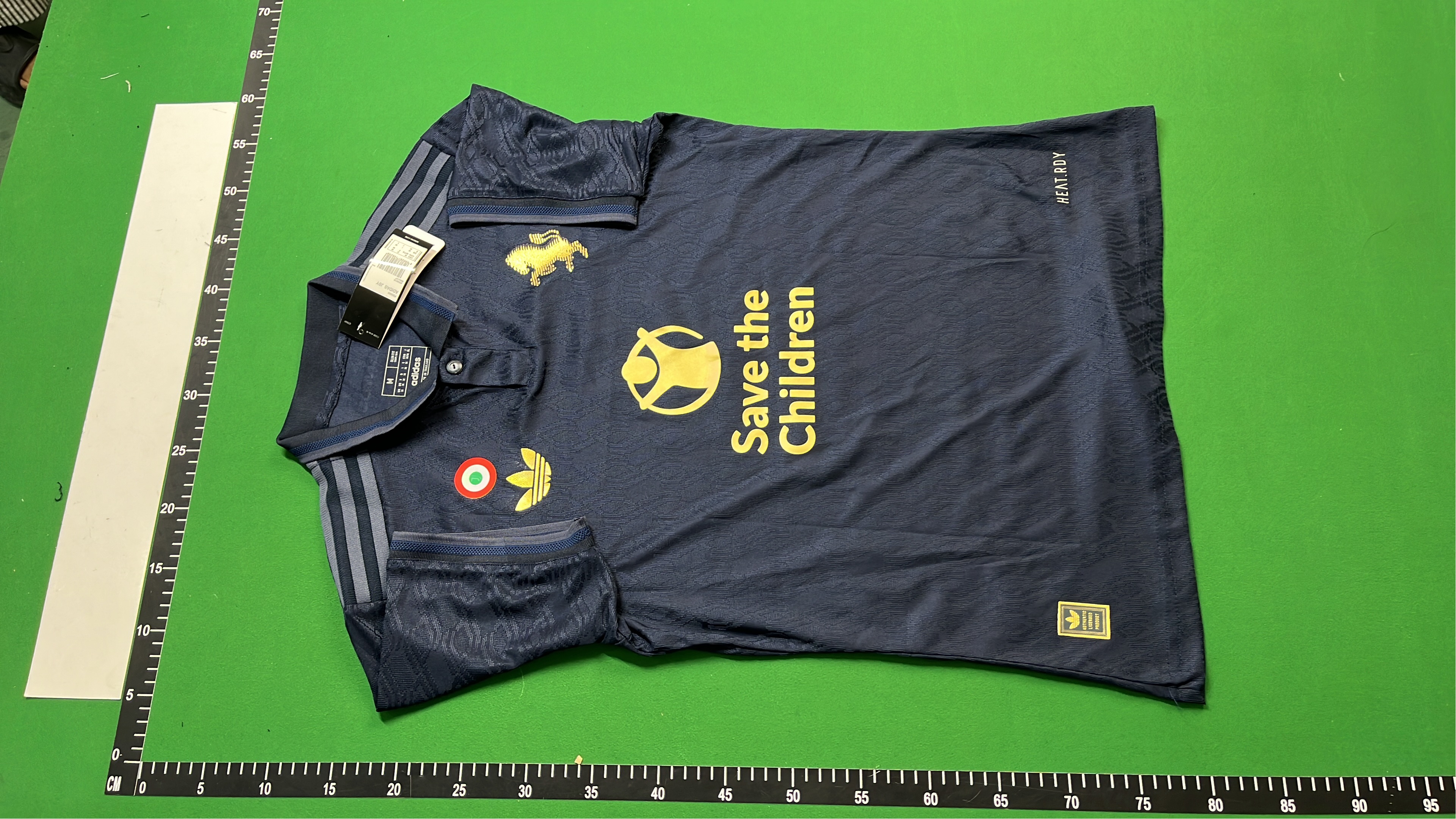 Save the Children Navy Blue Polo Shirt with Gold Logo