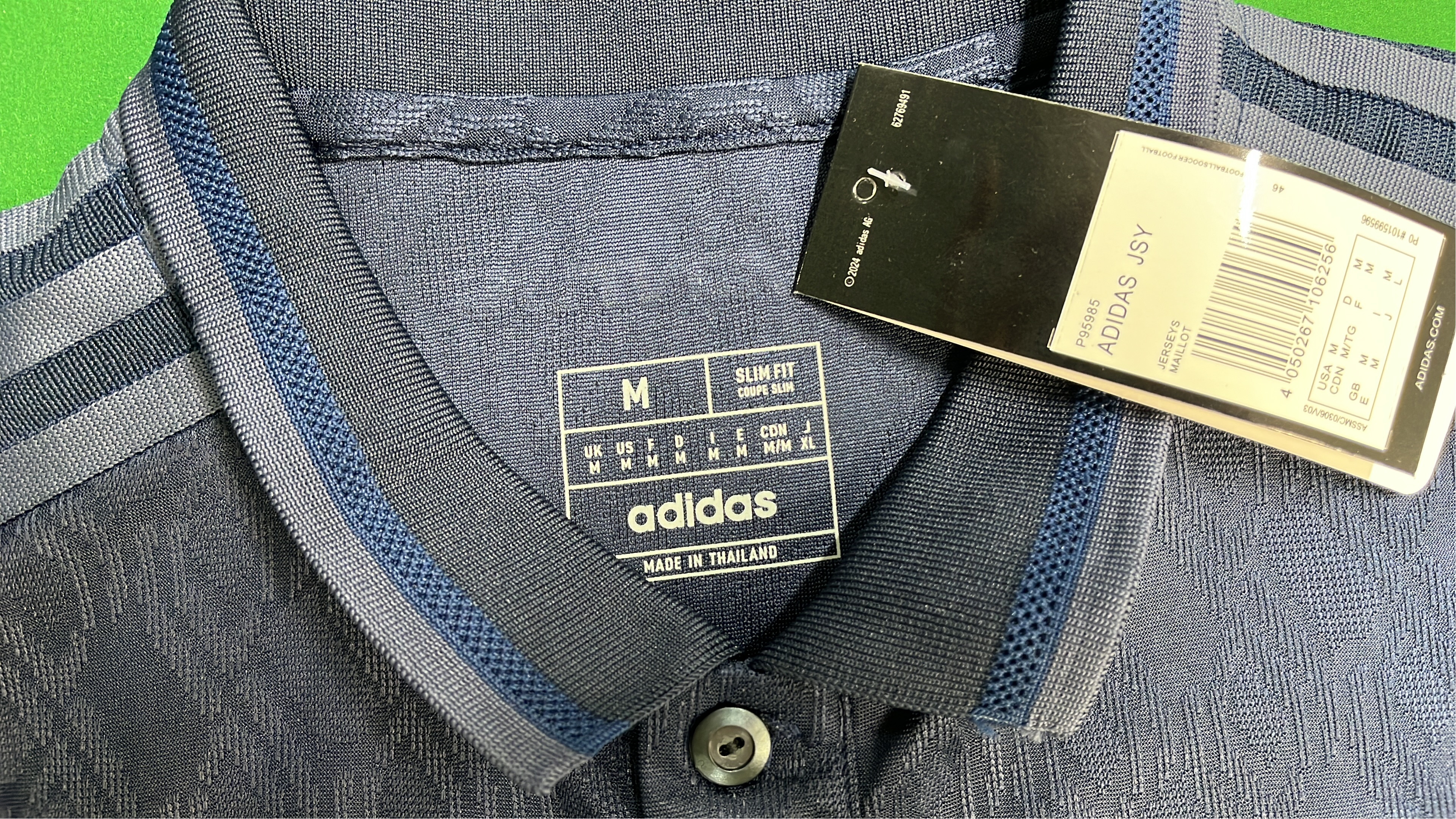 Save the Children Navy Blue Polo Shirt with Gold Logo