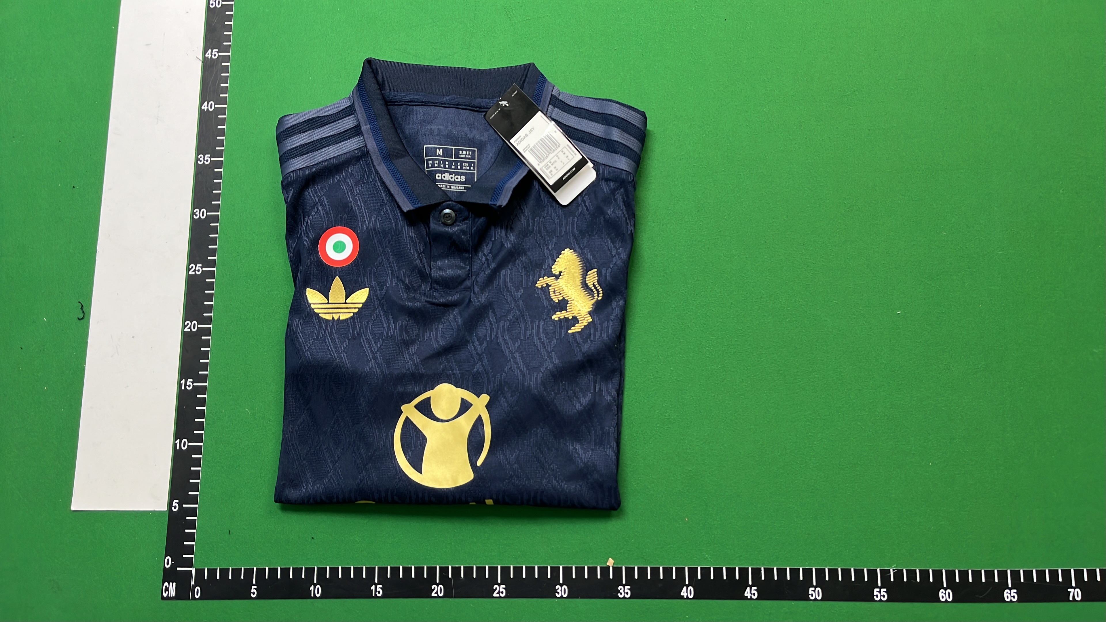 Save the Children Navy Blue Polo Shirt with Gold Logo