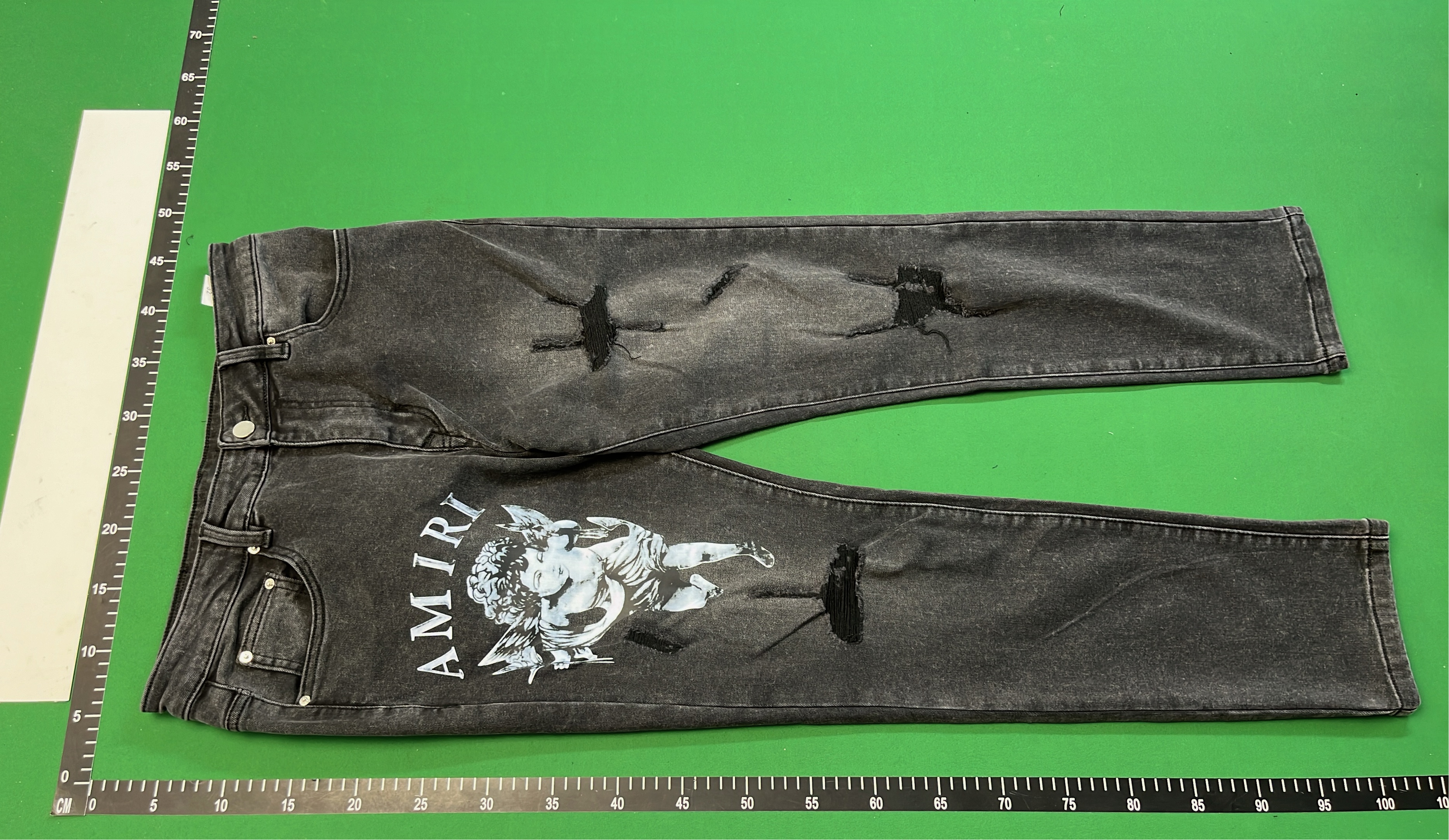 AMIRI Black Distressed Denim Jeans with Angel Print
