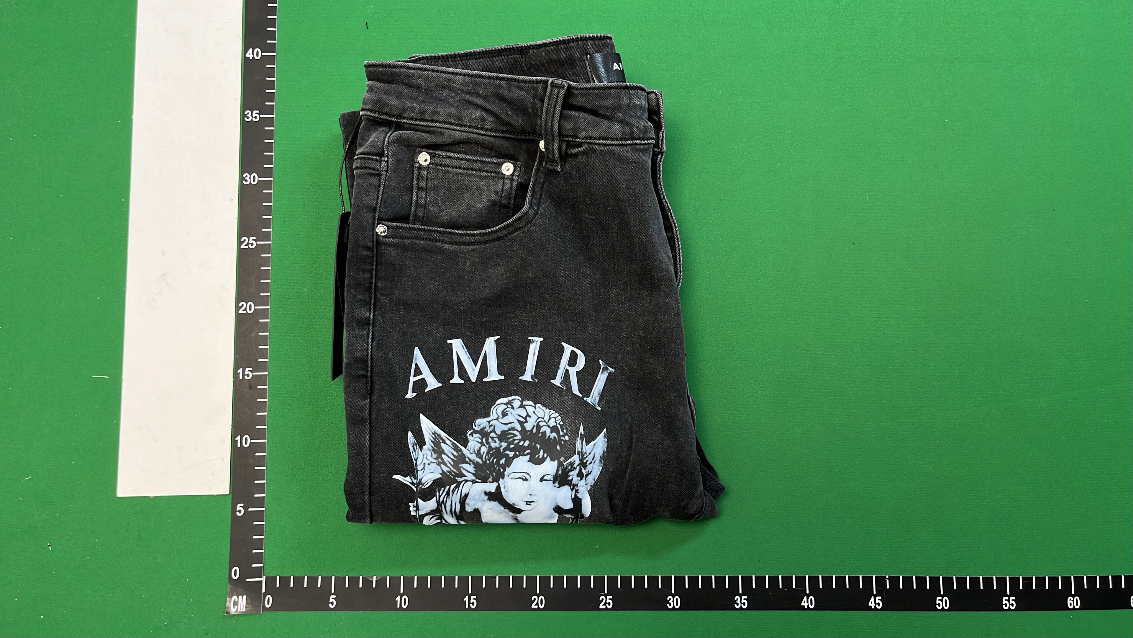 AMIRI Black Distressed Denim Jeans with Angel Print