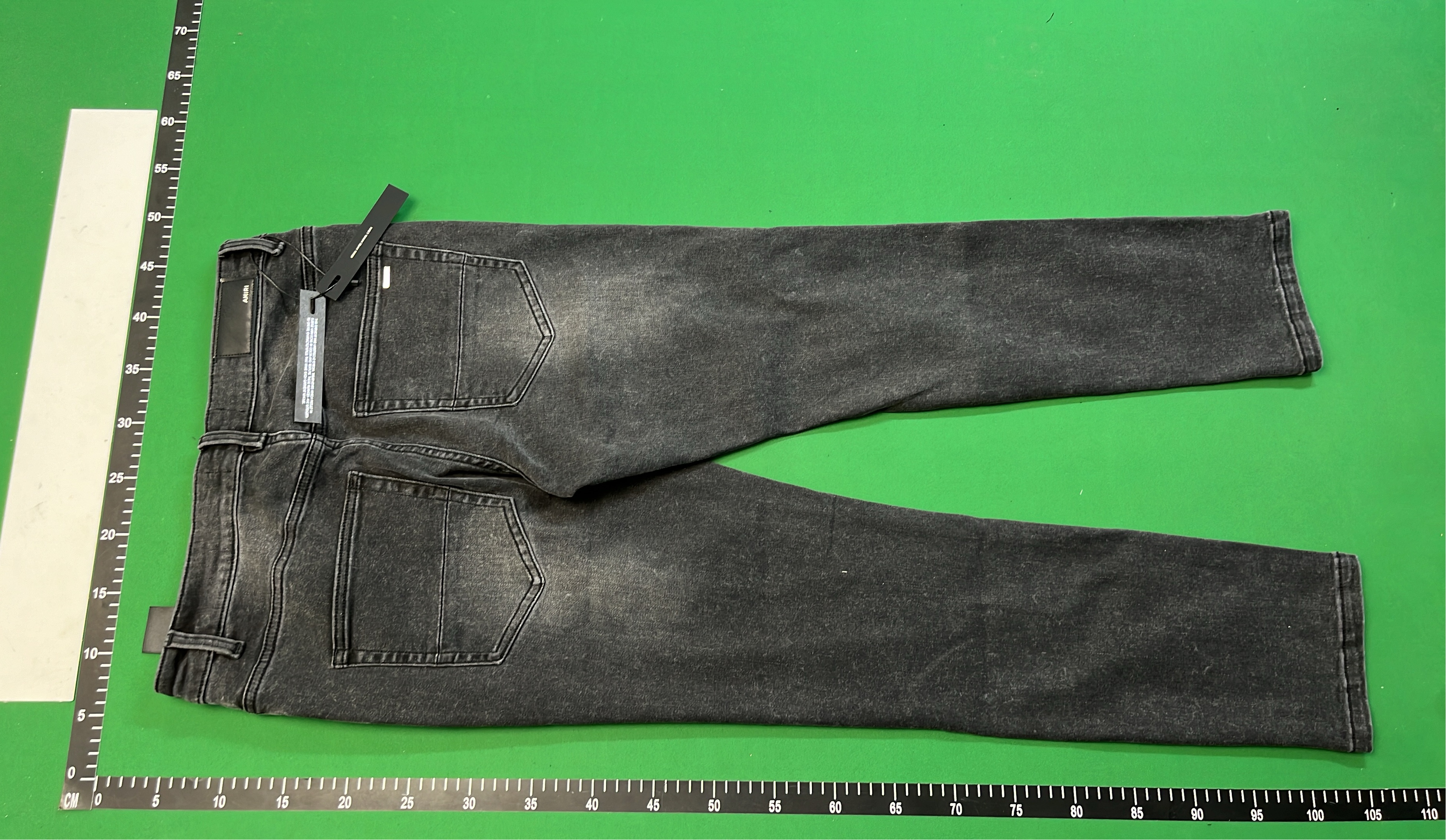 AMIRI Black Distressed Denim Jeans with Angel Print