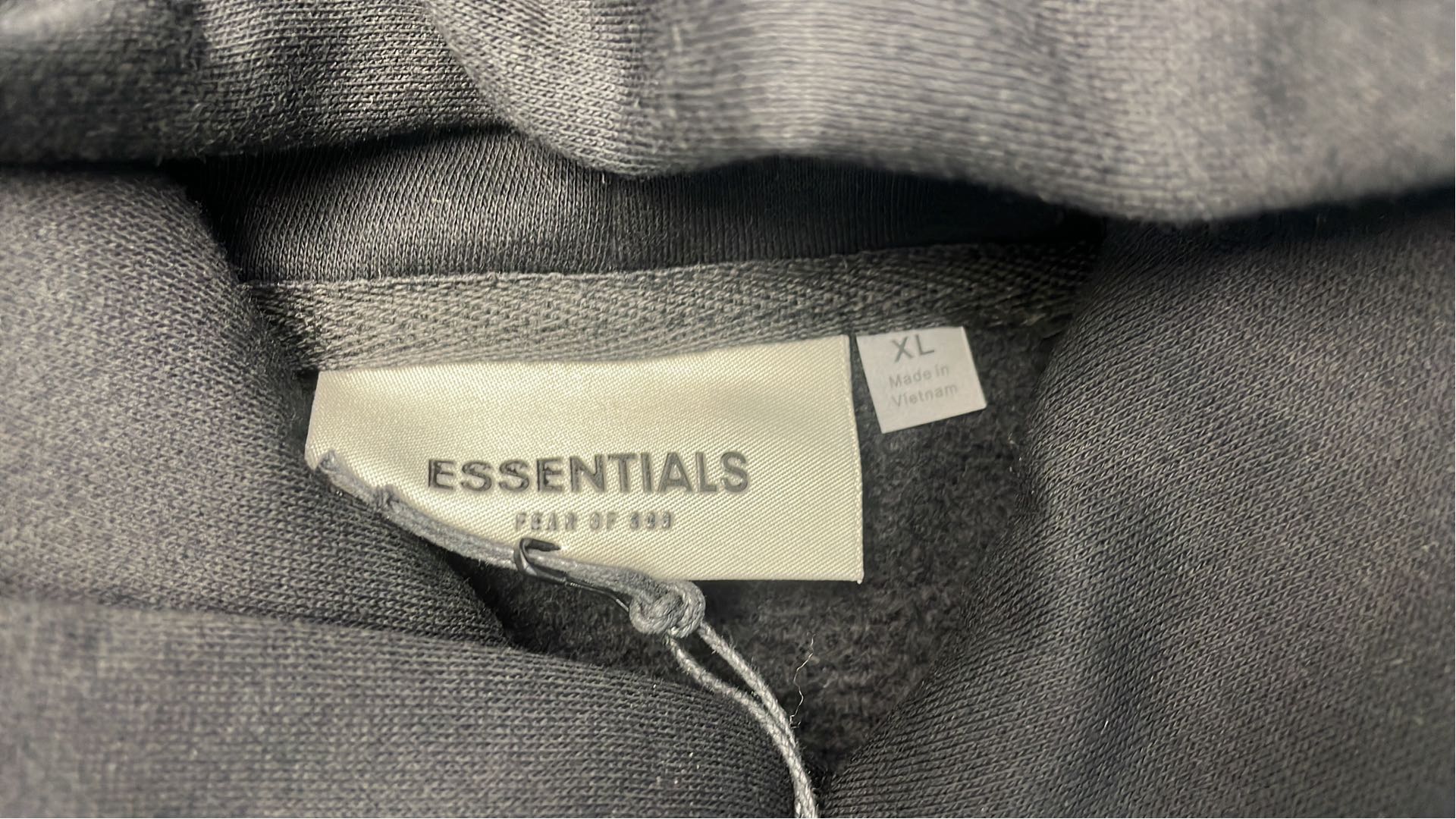 Black Essentials Hoodie with Subtle Logo Design