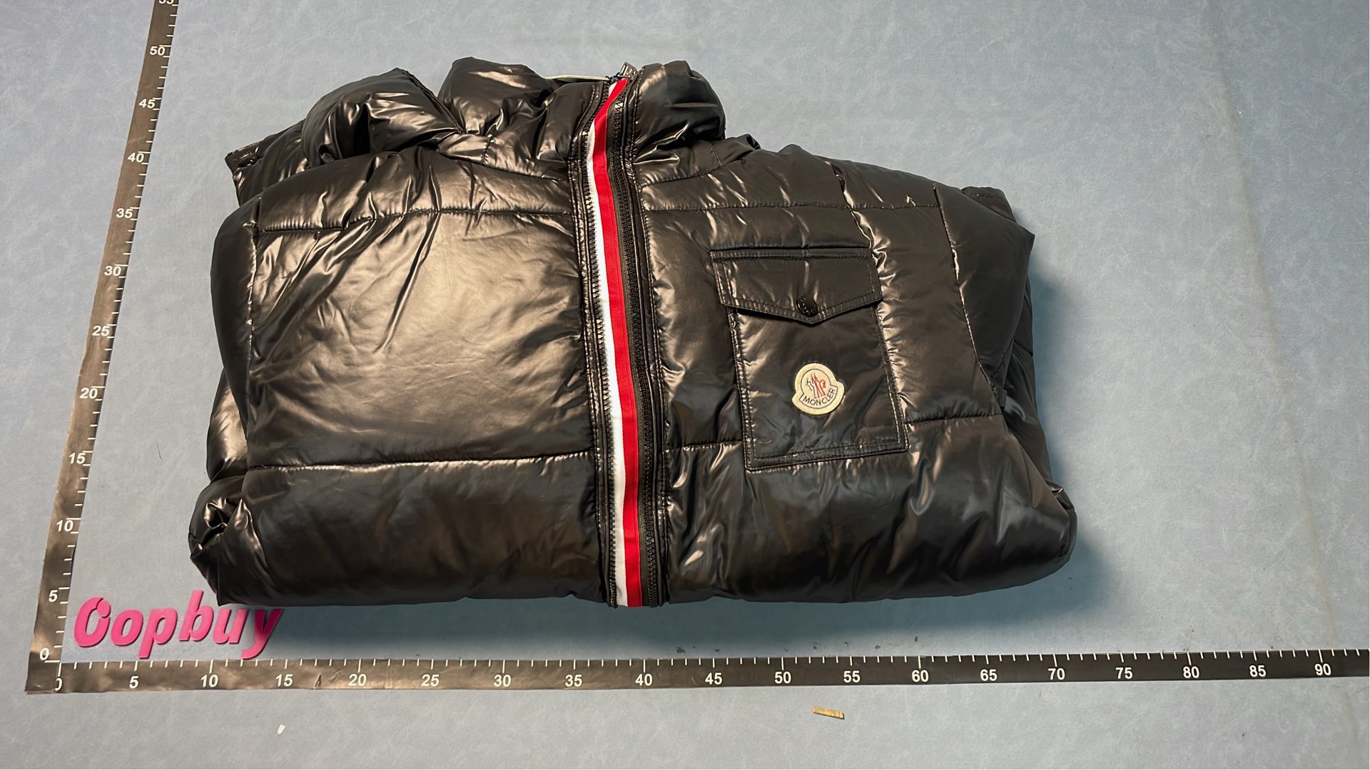 Moncler Black Puffer Jacket with Hood and Red Zipper