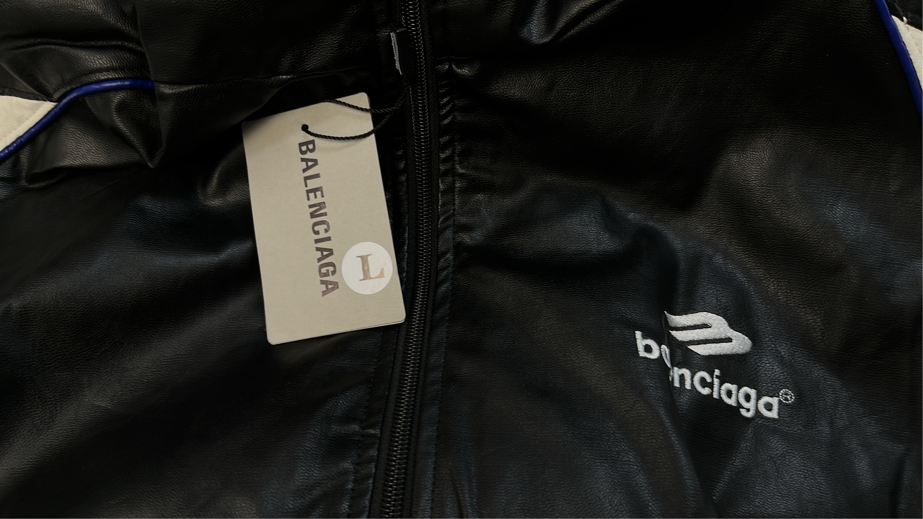 Black Hooded Track Jacket with Blue and White Accents