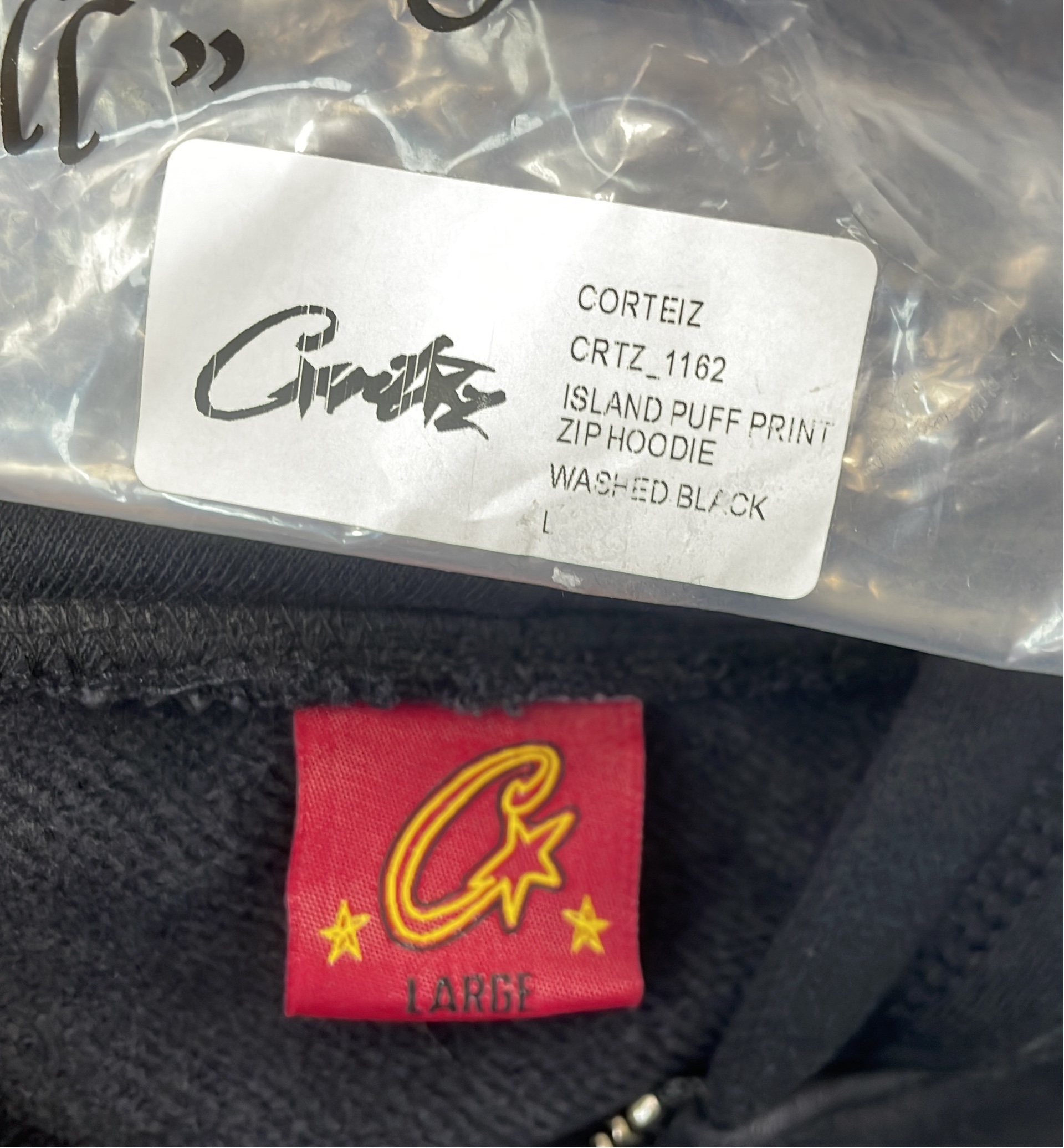 Black Zip-Up Hoodie with Minimal Logo Design