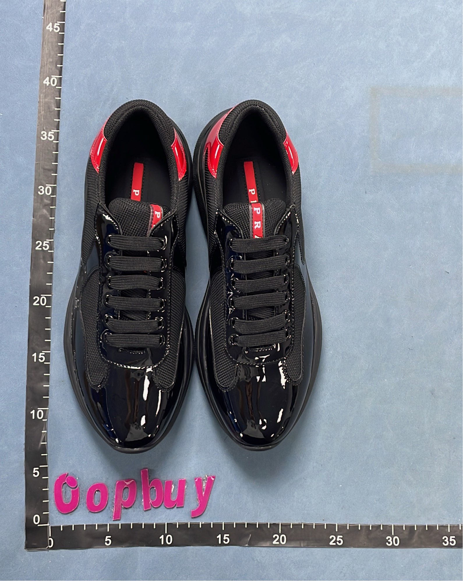 Black Patent Leather Sneakers with Red Accent