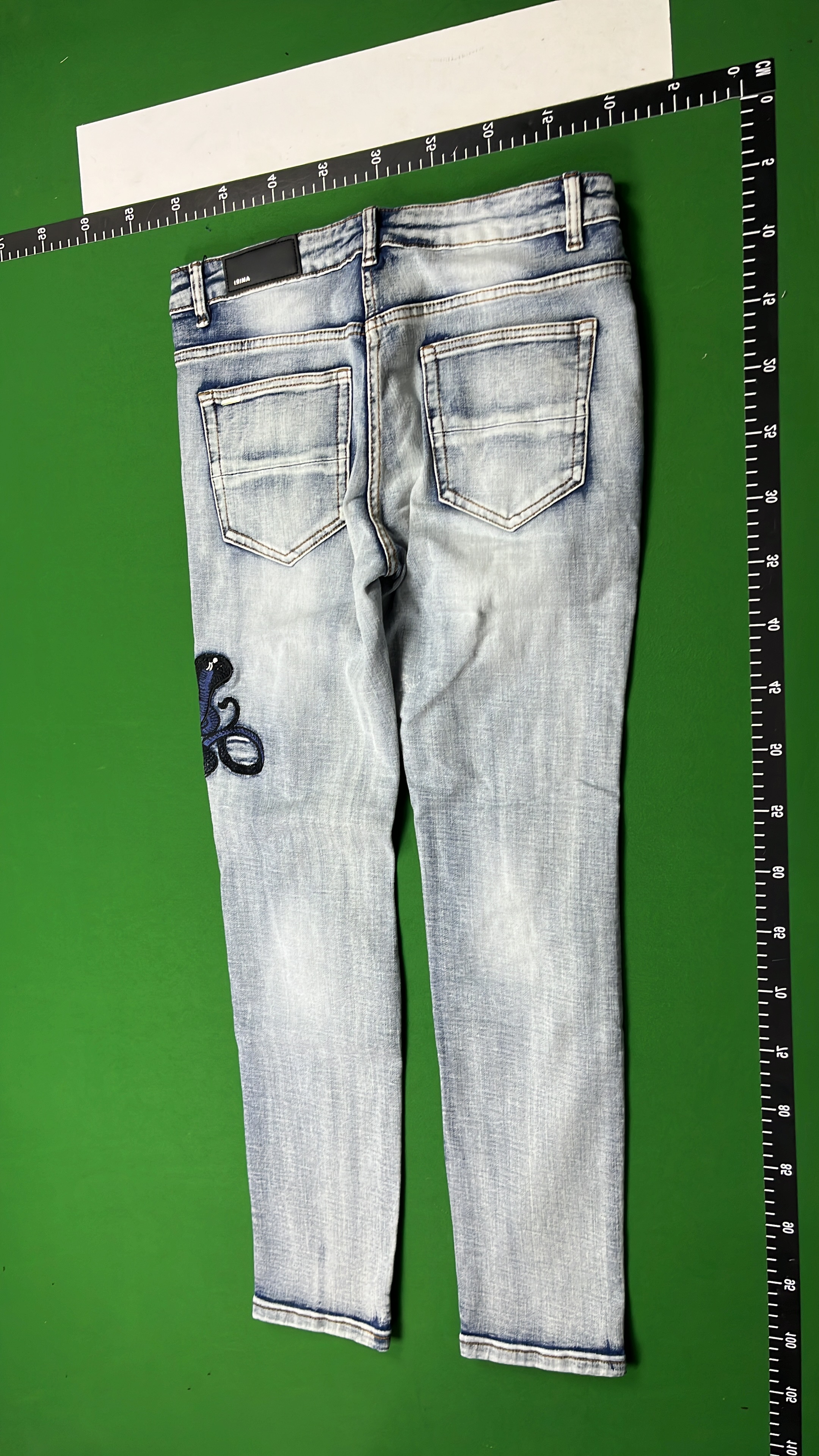 MIRI Distressed Denim Jeans with Red Embroidery