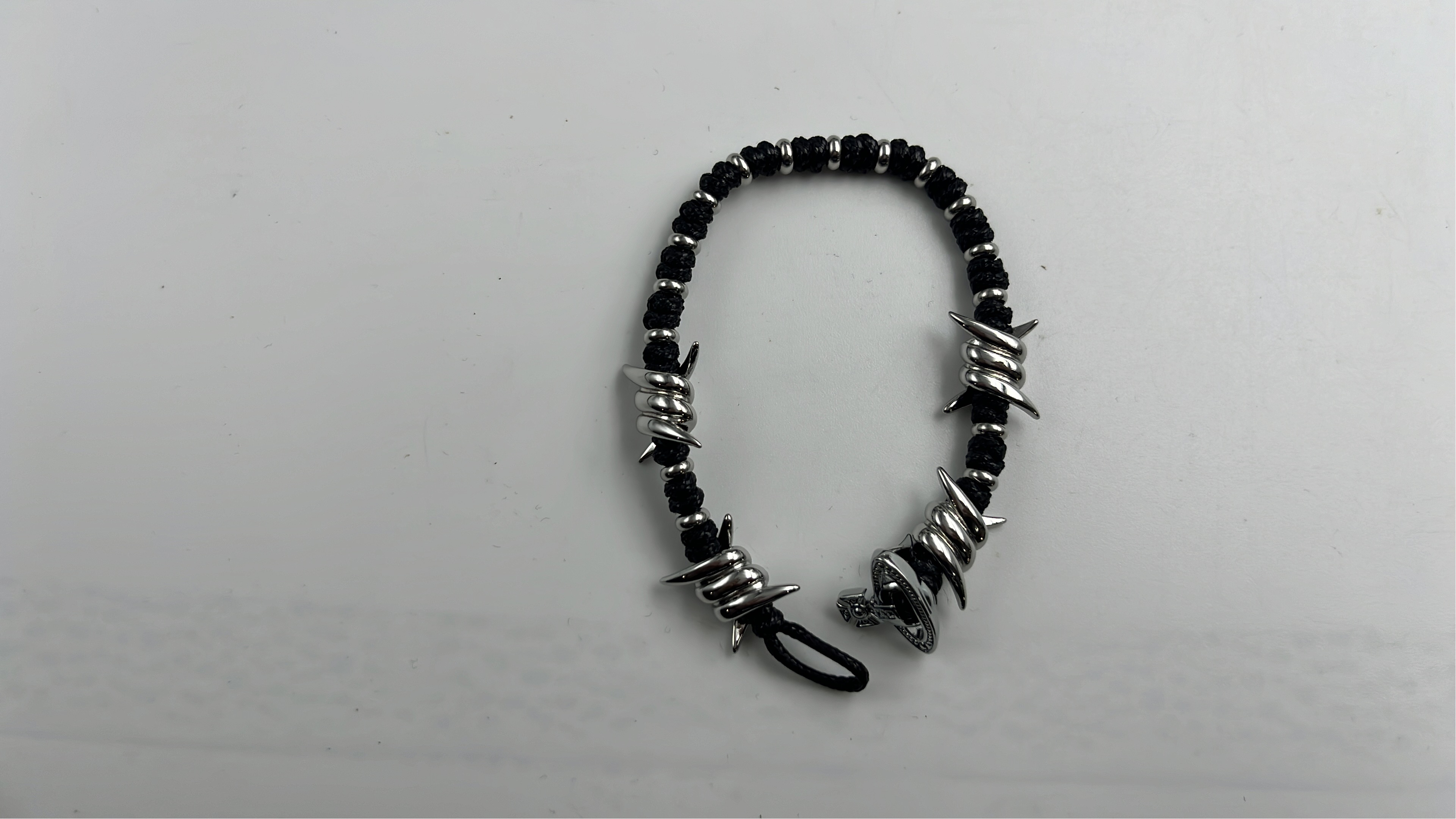 Vans Barbed Wire Bracelet with Cross Charm