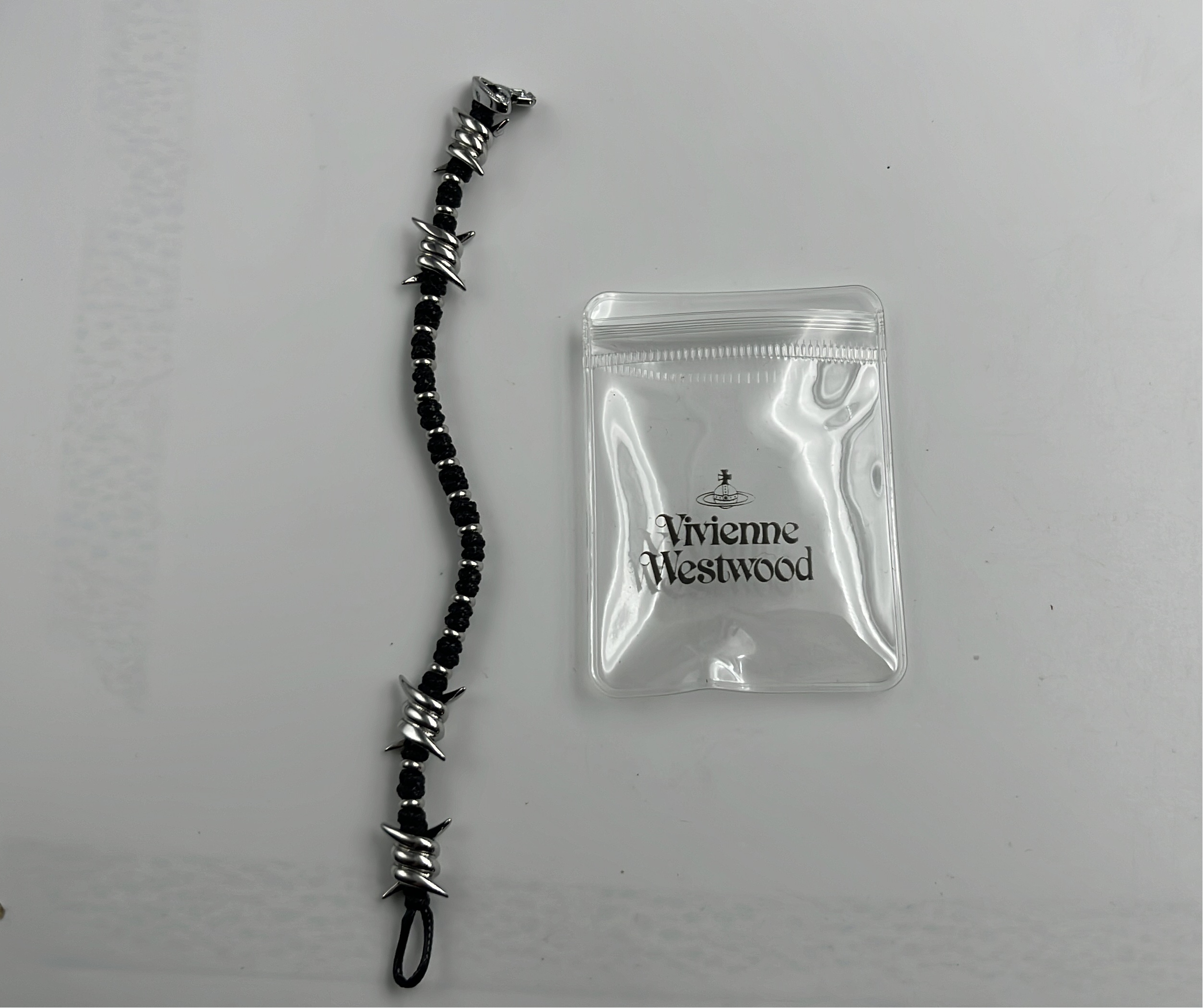Vans Barbed Wire Bracelet with Cross Charm