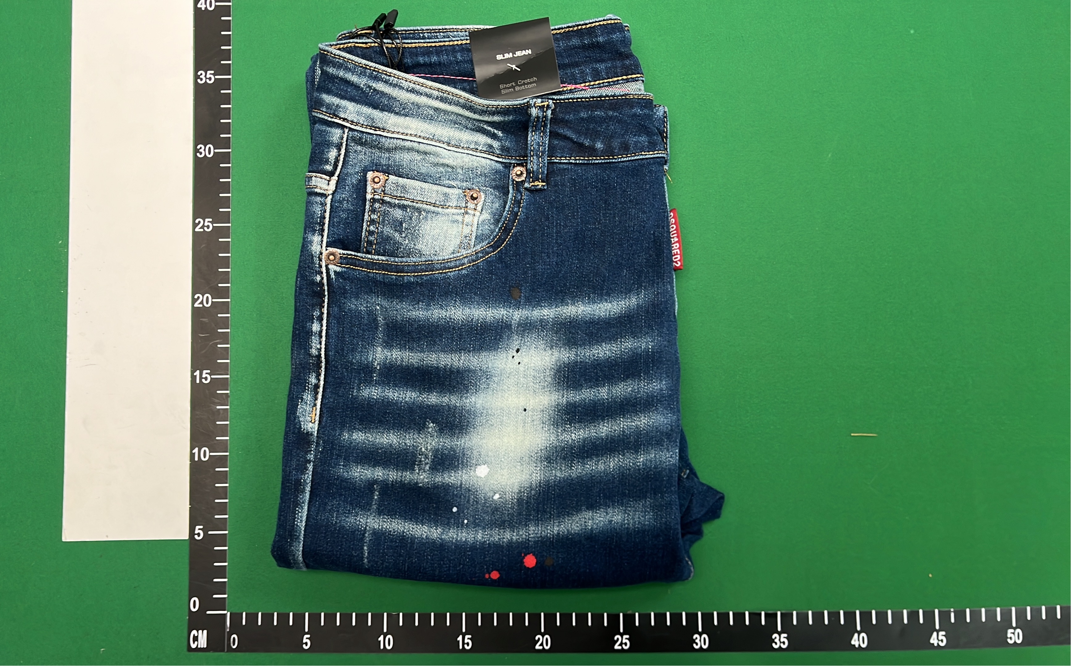 DSQUARED2 ICON Black Denim Jeans with Paint Splatter Design