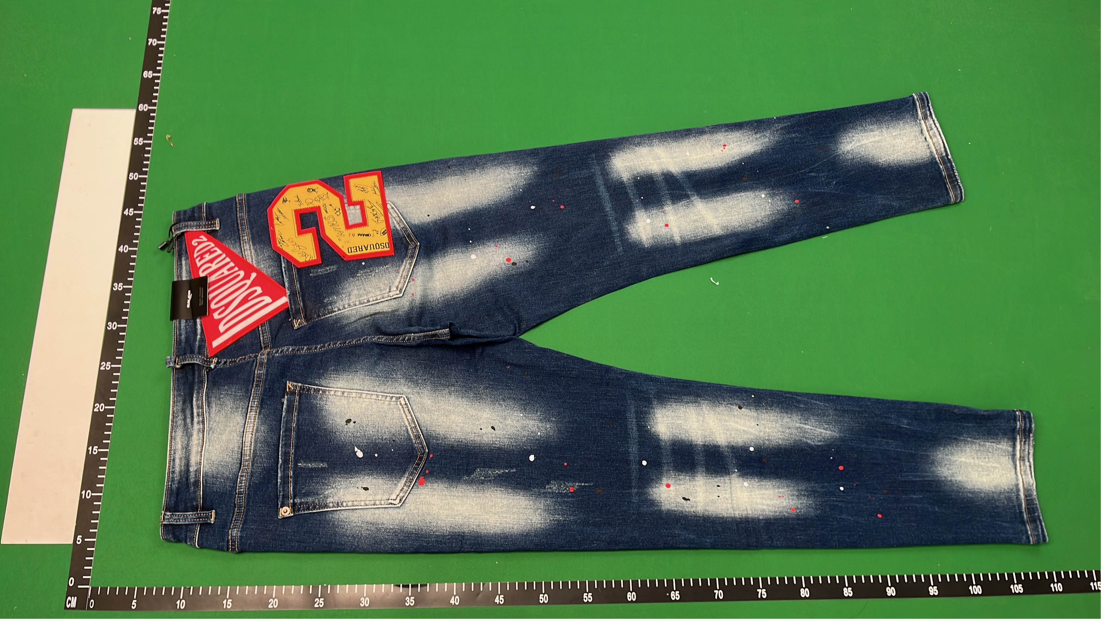 DSQUARED2 ICON Black Denim Jeans with Paint Splatter Design