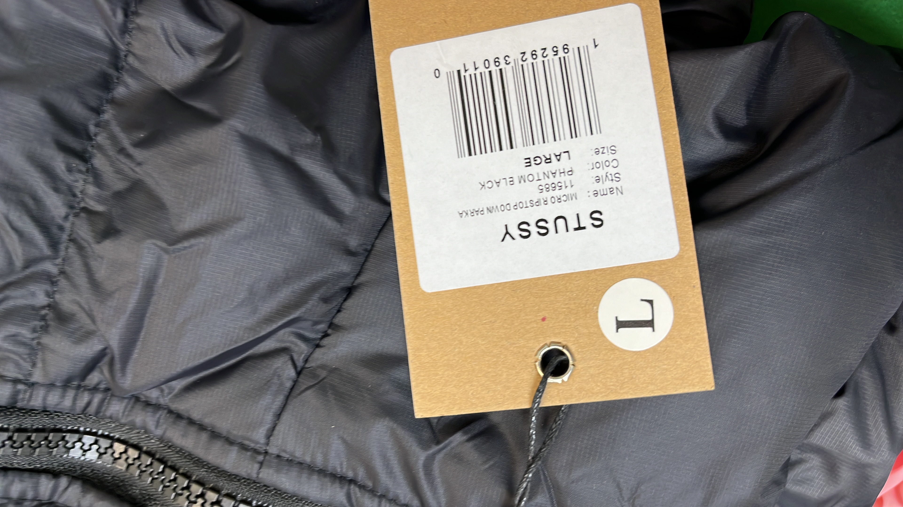 Stussy Black Puffer Jacket with Hood and Pink Lining