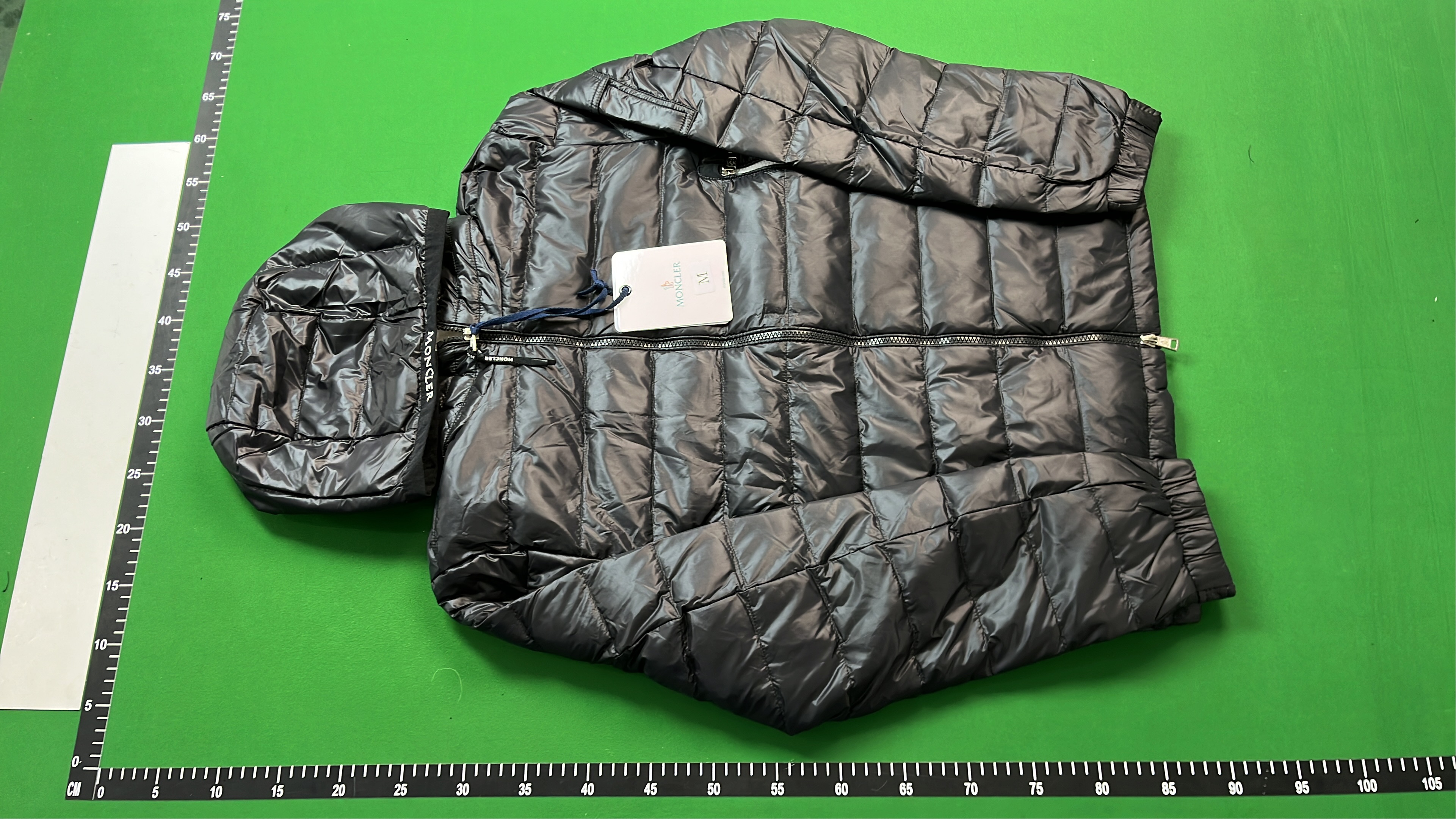 Moncler Black Hooded Puffer Jacket with Zippered Pockets