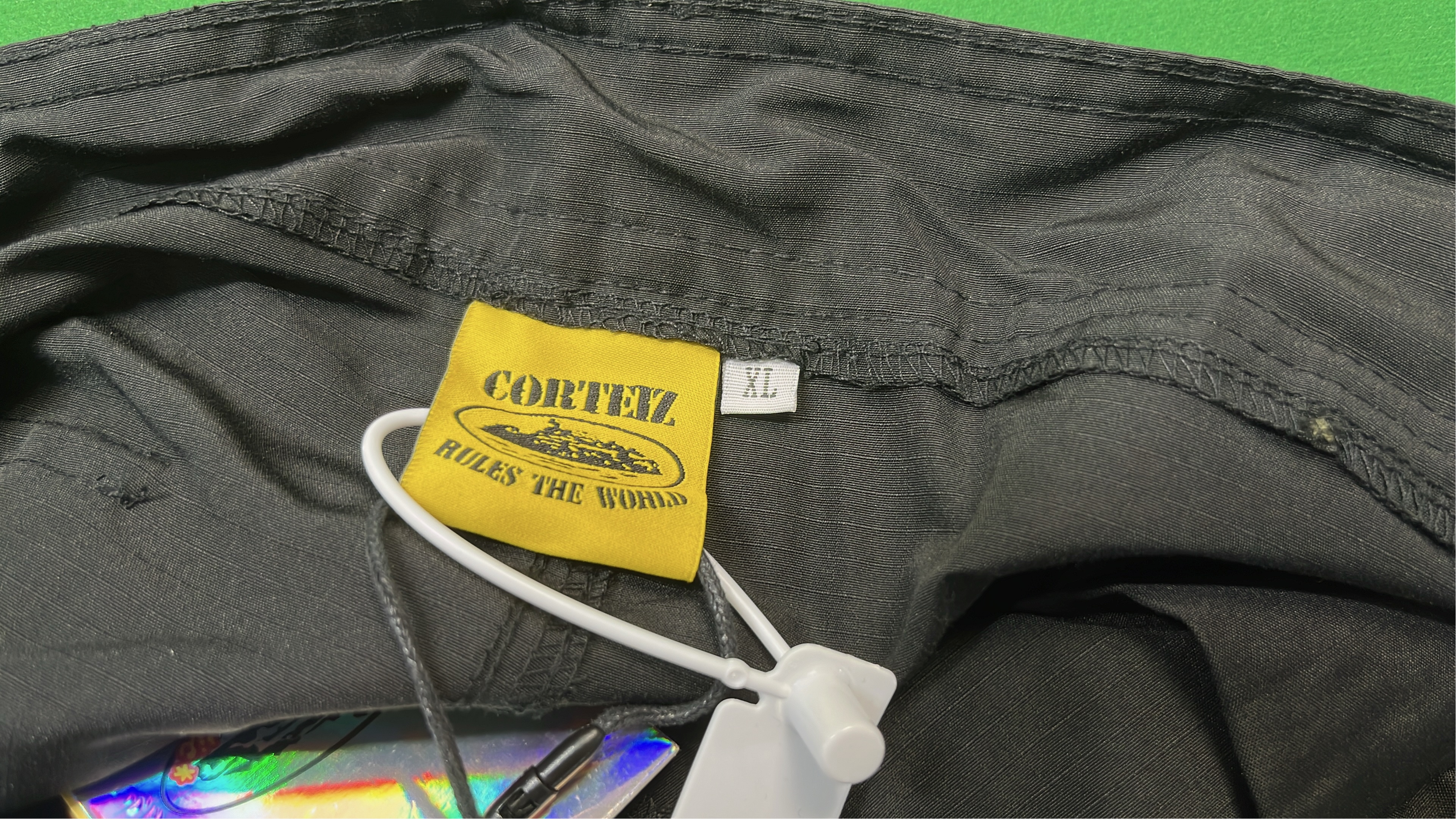Beige Cargo Shorts with White Graphic Print