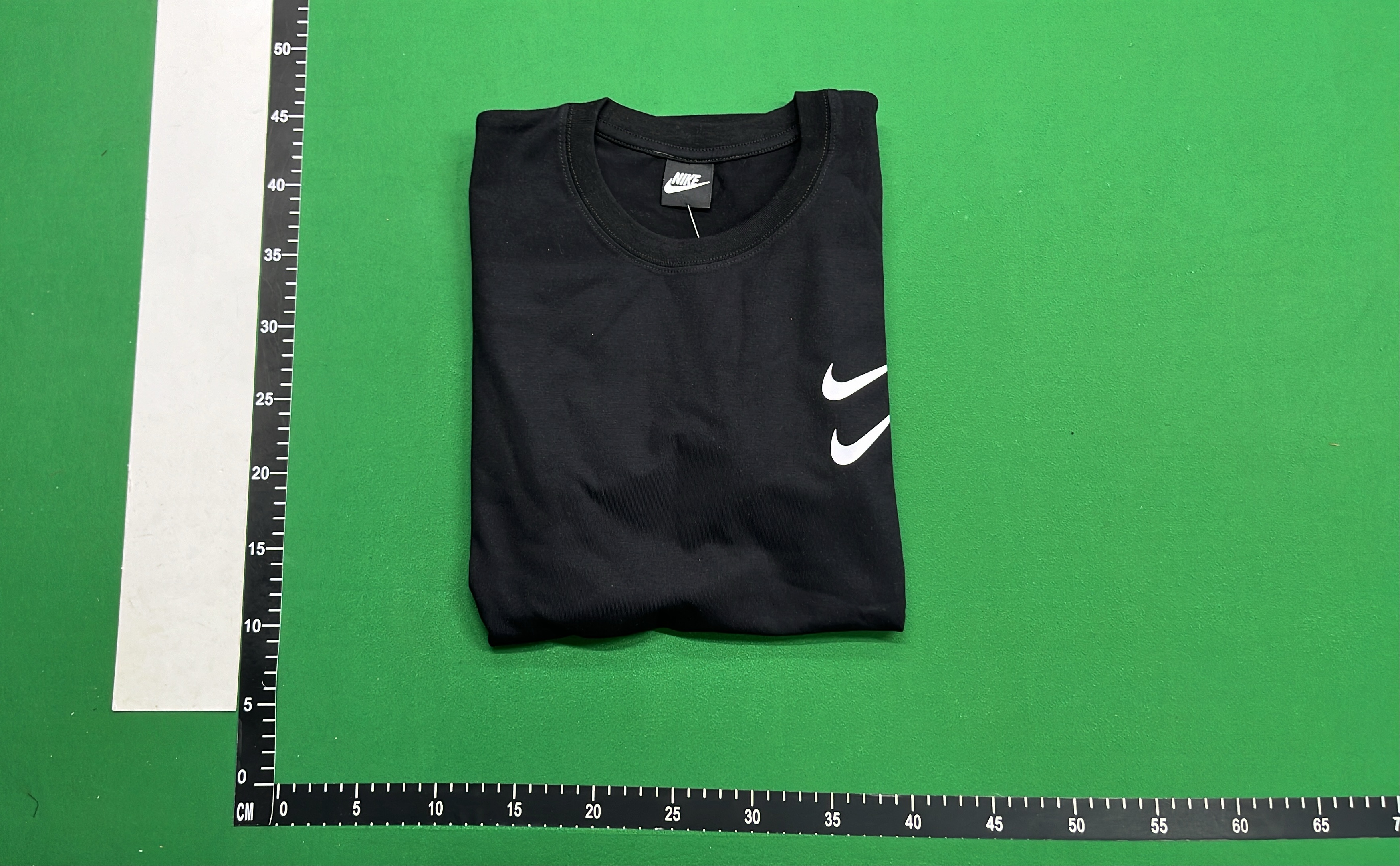 Nike White T-Shirt with Black Swoosh Logo