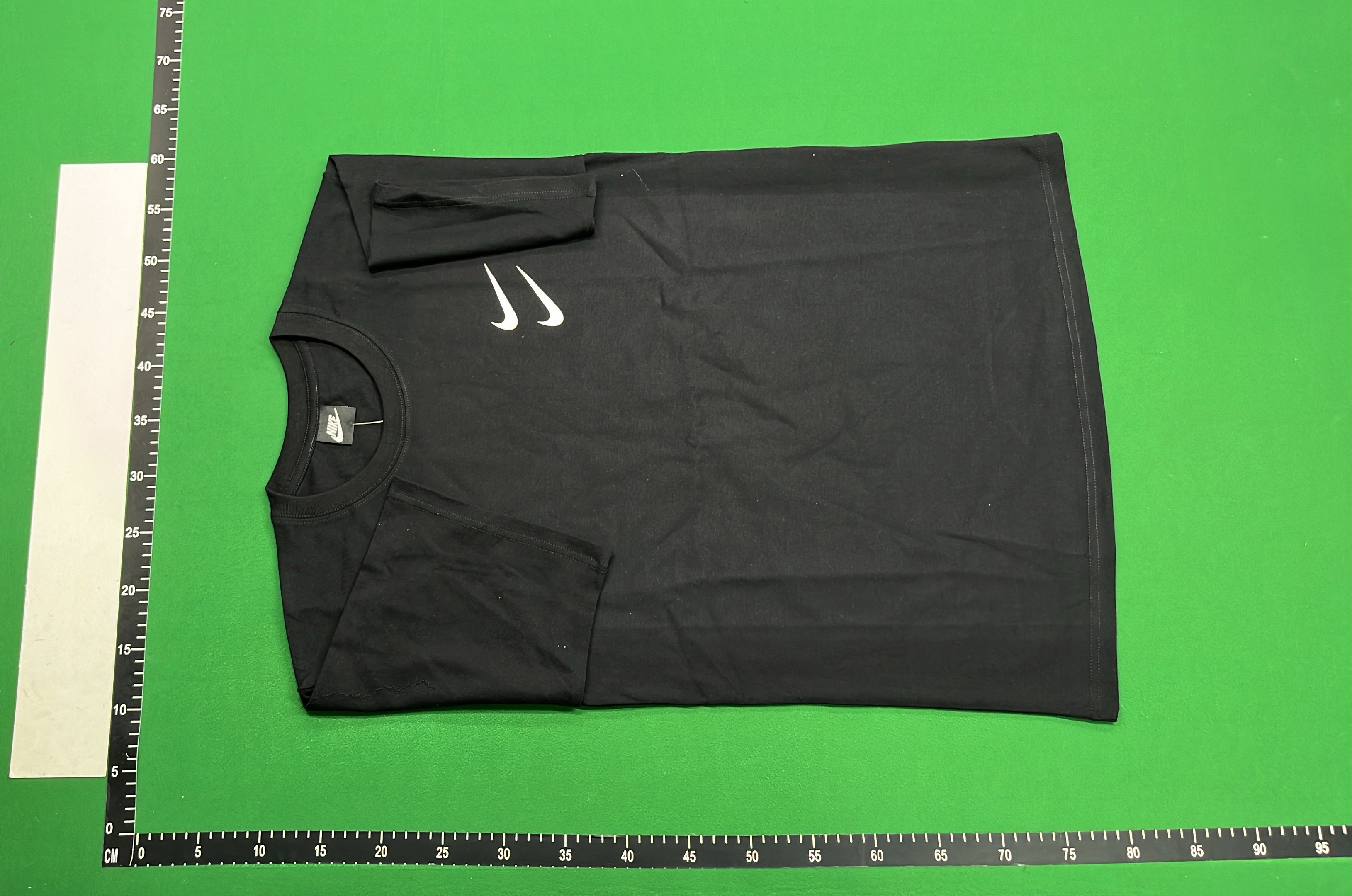 Nike White T-Shirt with Black Swoosh Logo
