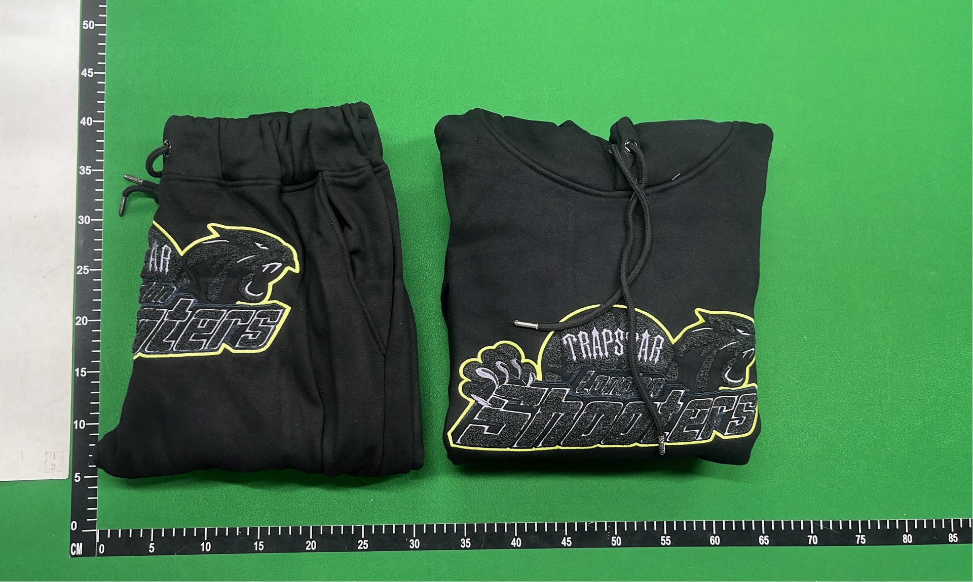 Black Hoodie and Pants Set with Glow Design