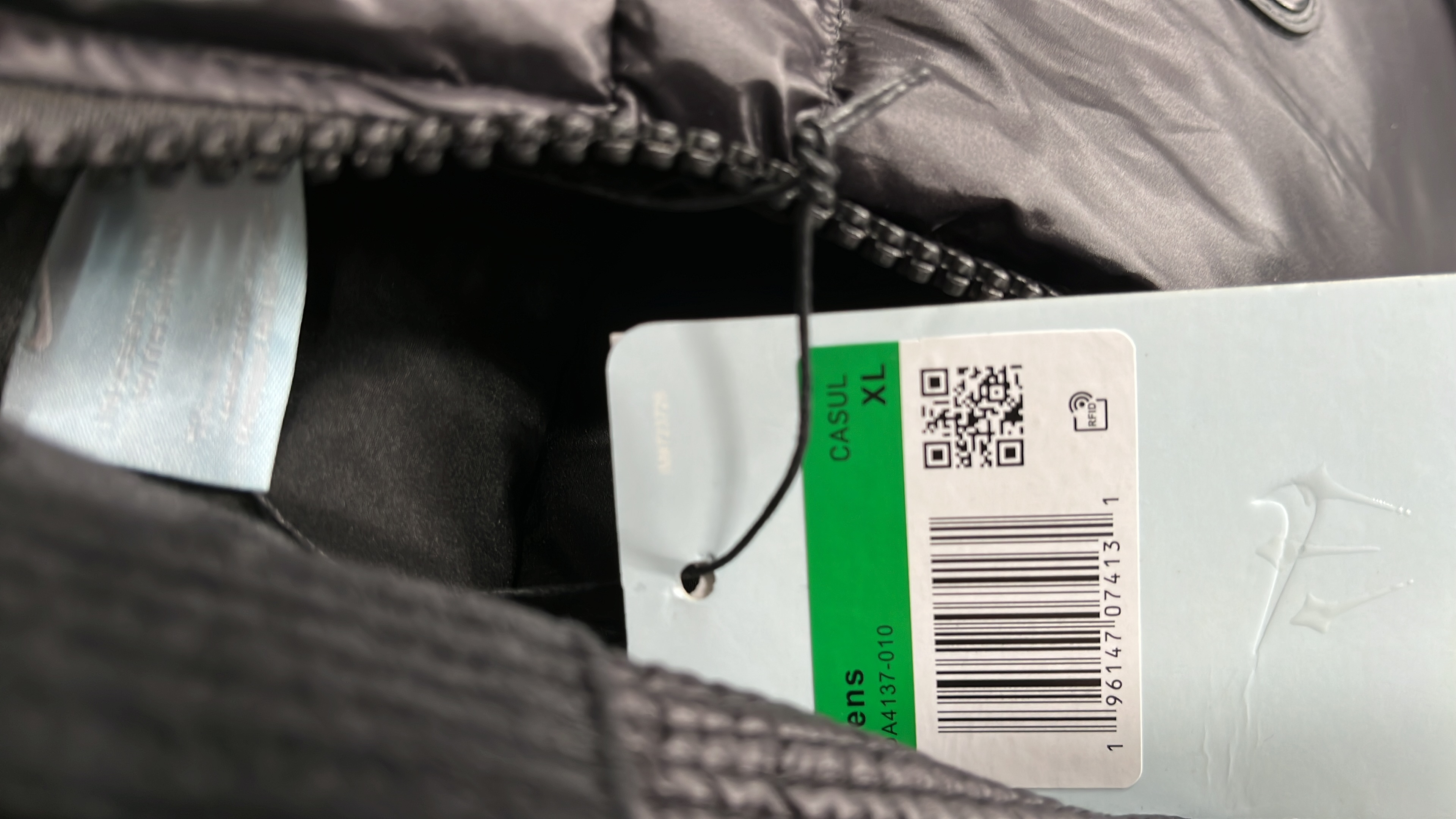NOCTA Yellow Puffer Jacket with Nike Swoosh