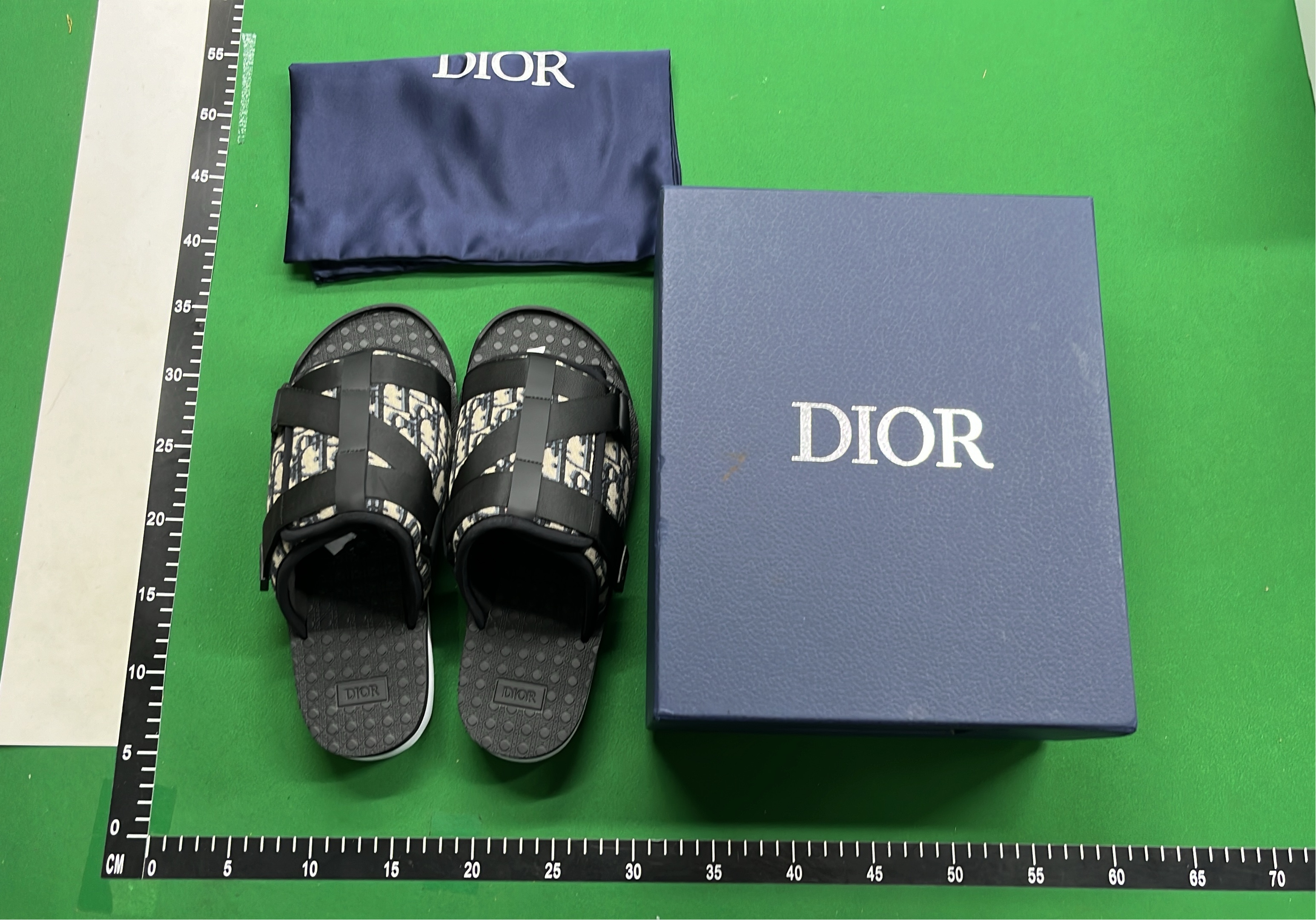 Dior Oblique Print Slide Sandals in Black and White