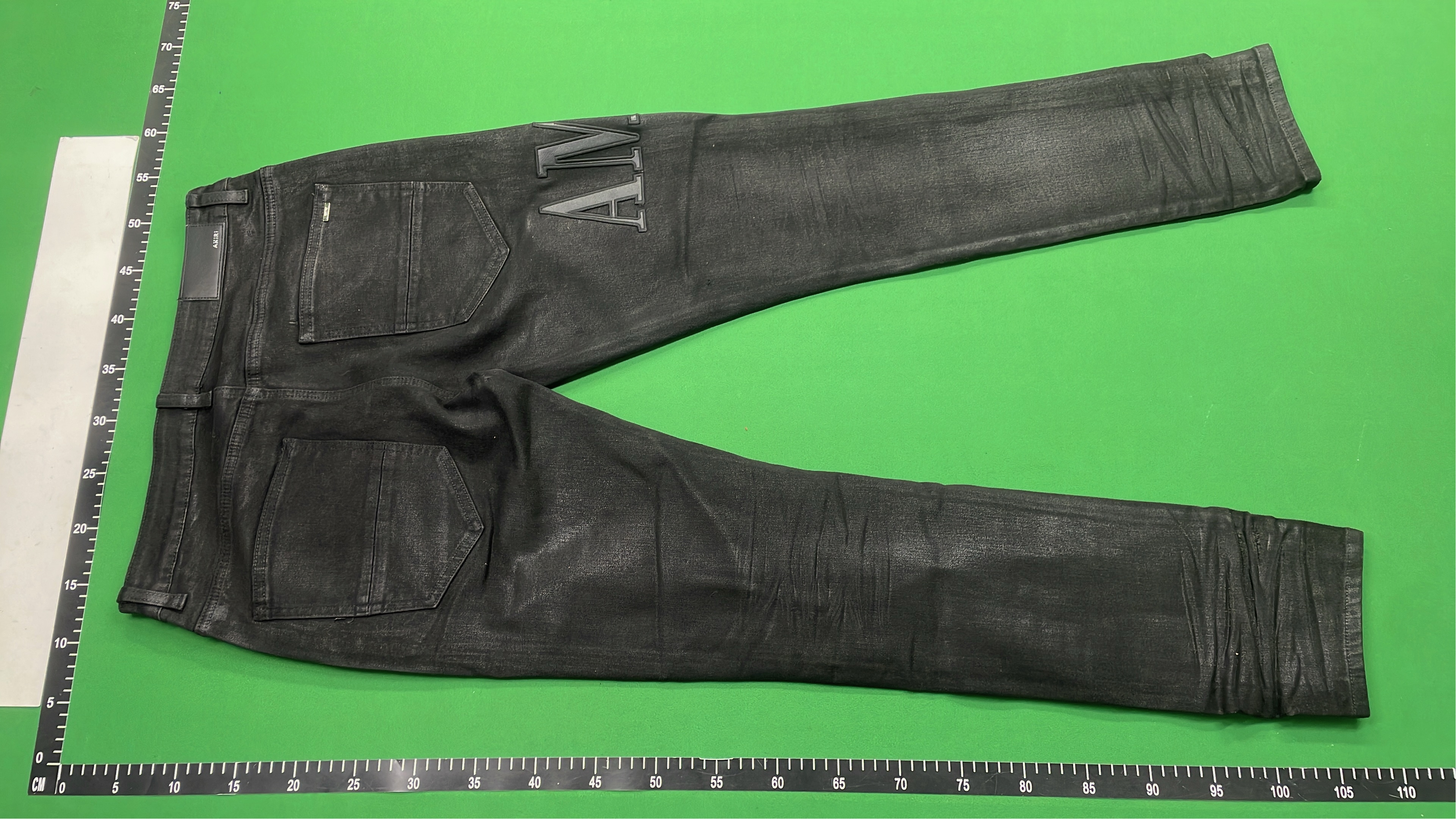 Distressed Black Denim Jeans with Bold Logo Design