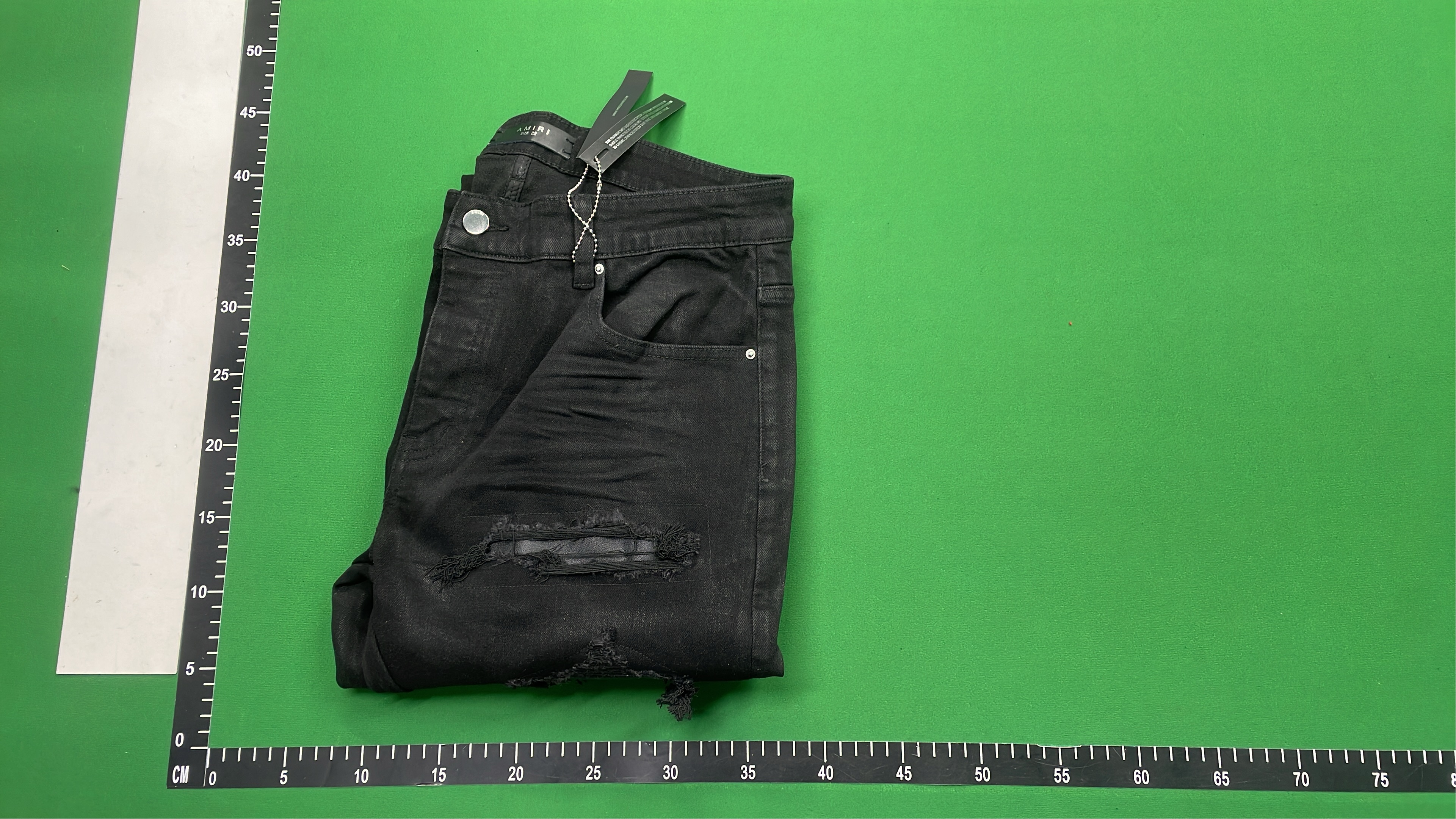 Distressed Black Denim Jeans with Bold Logo Design