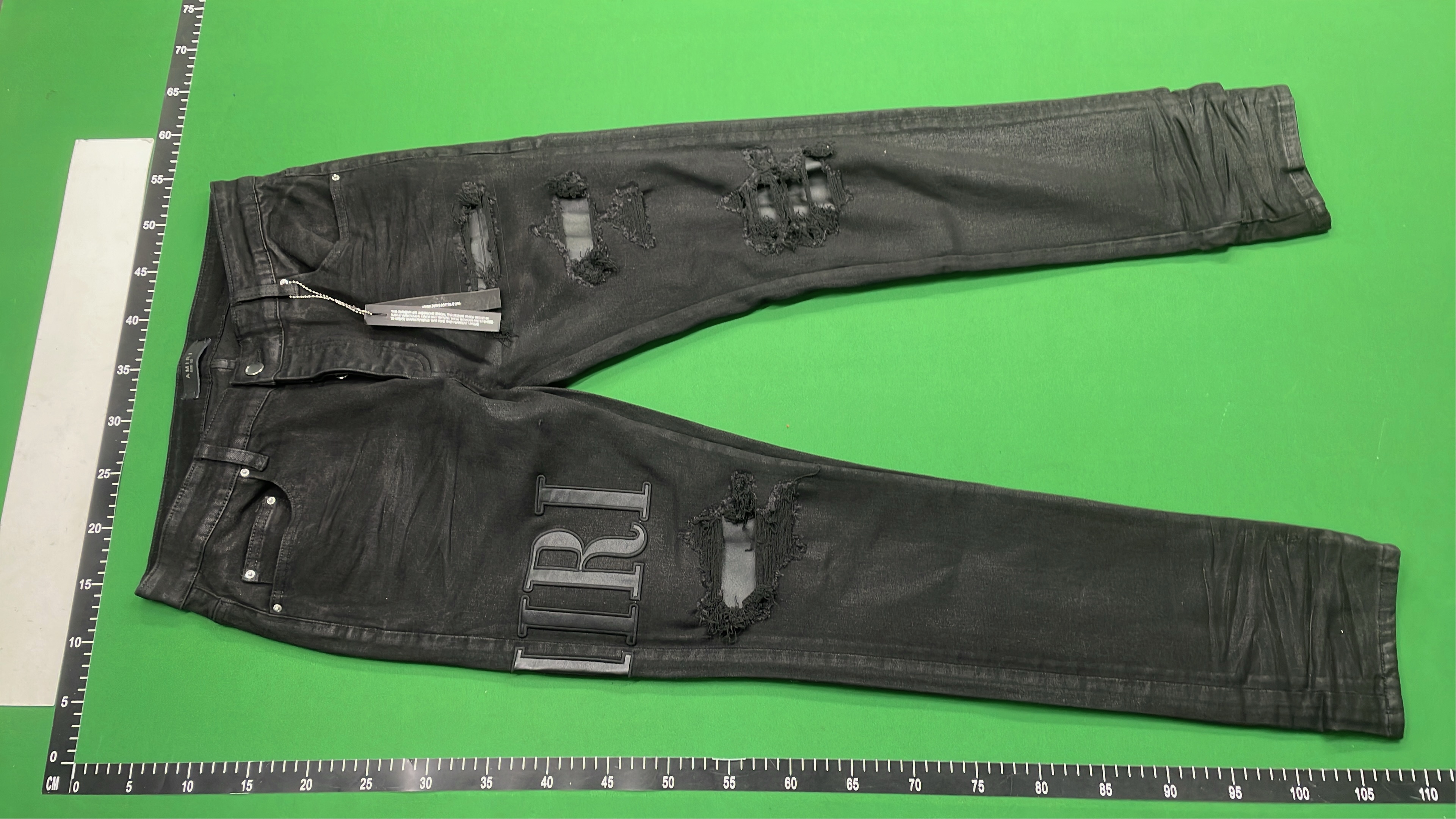 Distressed Black Denim Jeans with Bold Logo Design