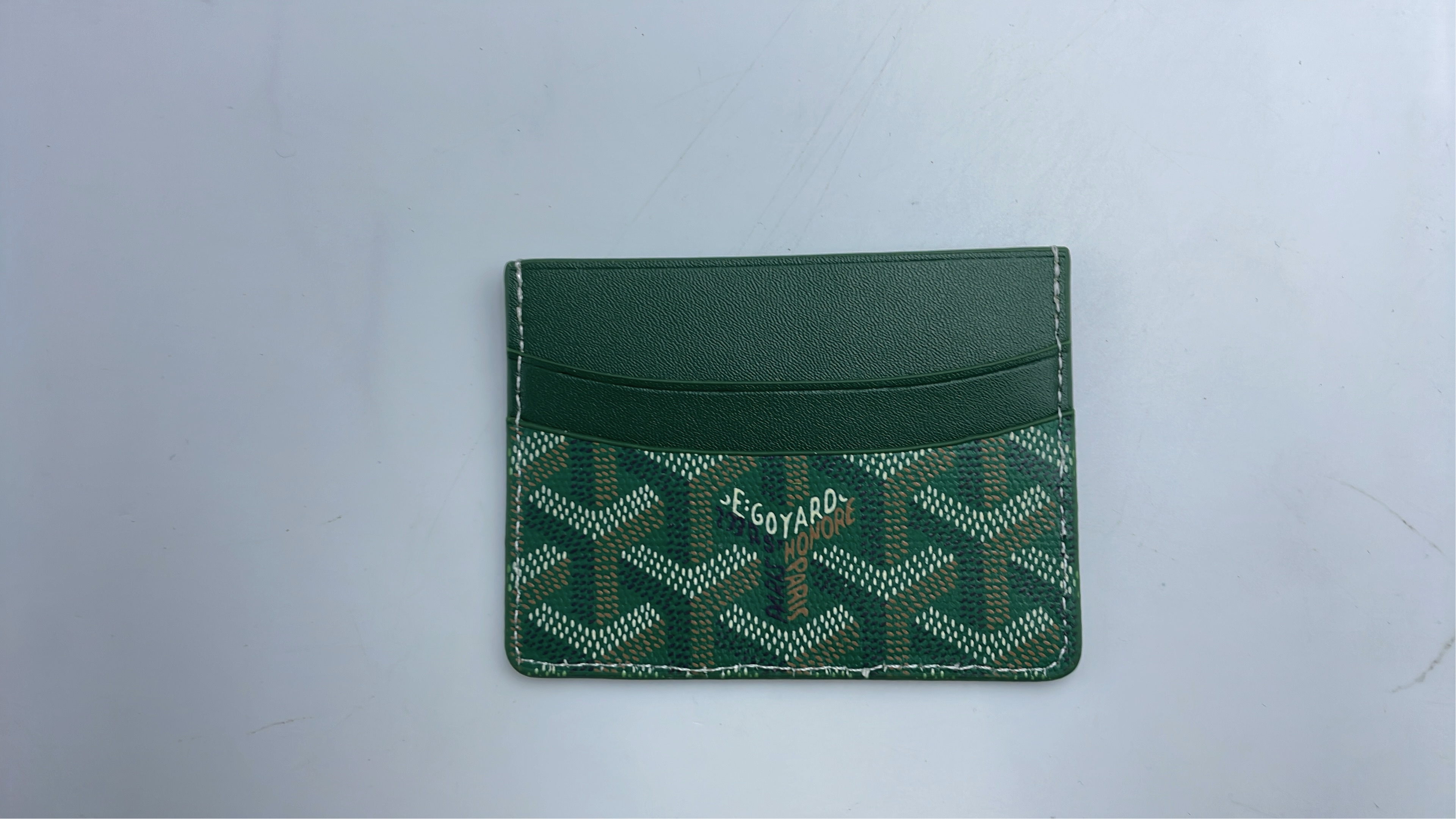 MCM Orange Leather Card Holder with Monogram Pattern