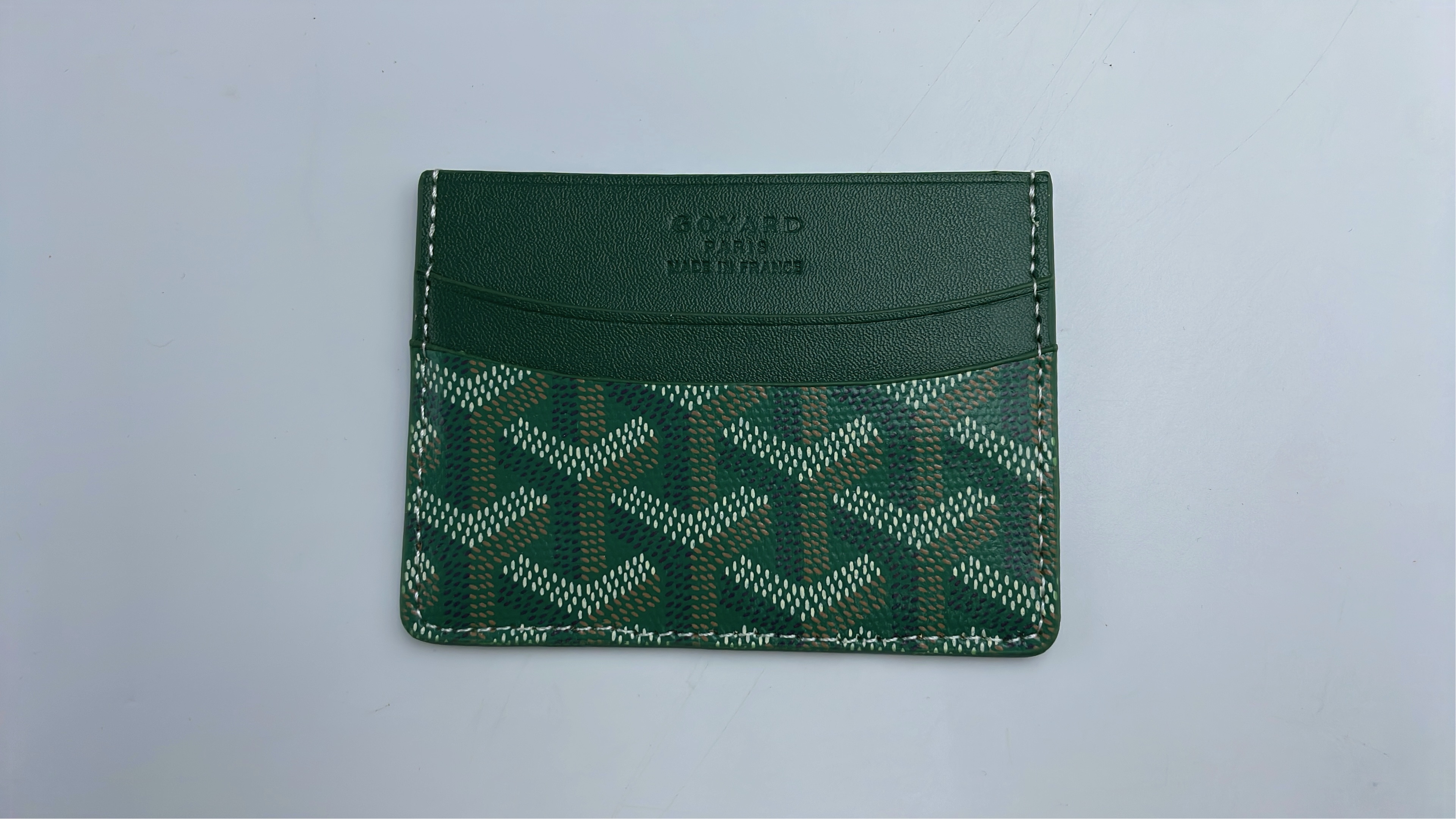 MCM Orange Leather Card Holder with Monogram Pattern