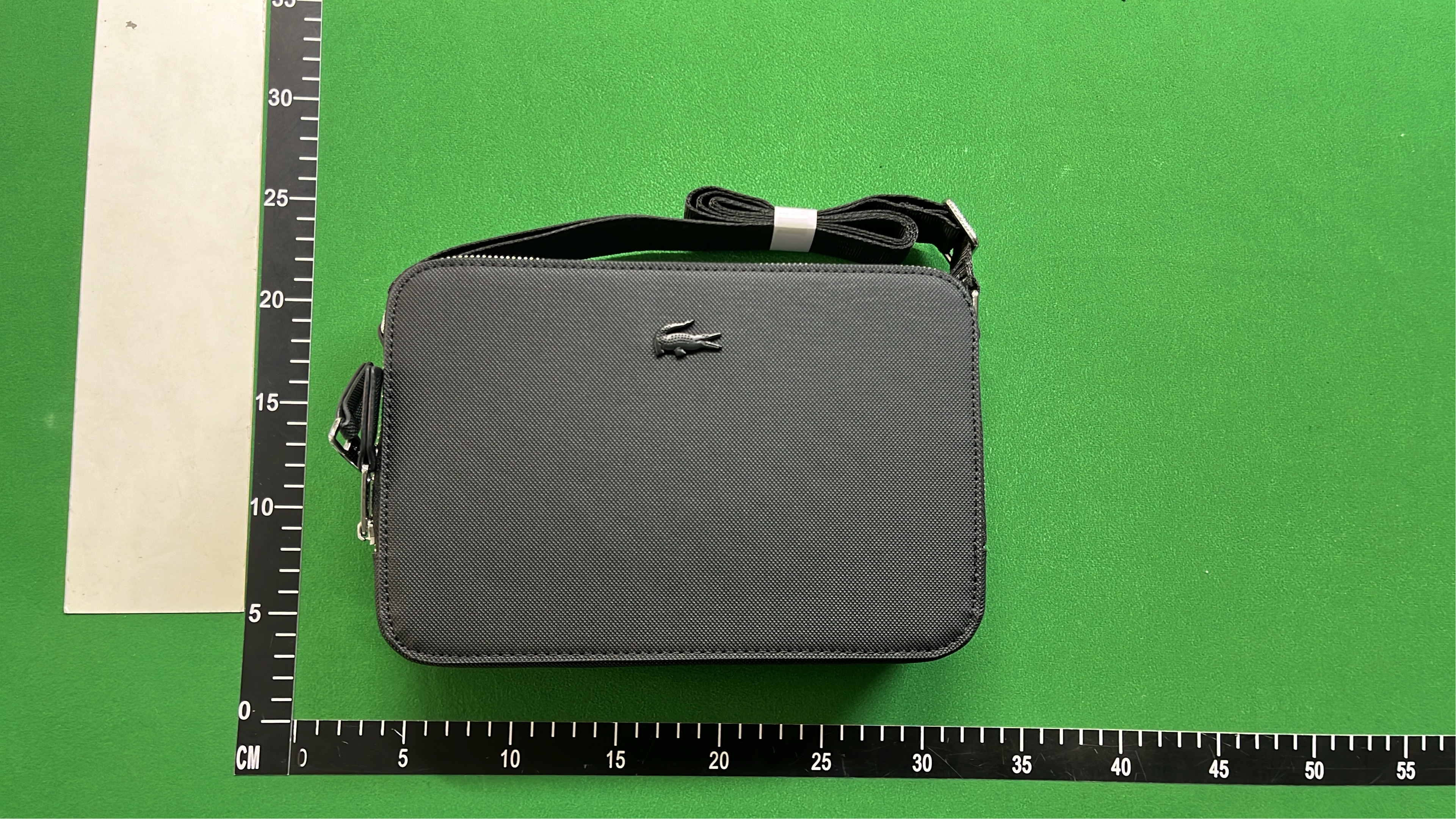 Lacoste Black Crossbody Bag with Zip Closure and Adjustable Strap