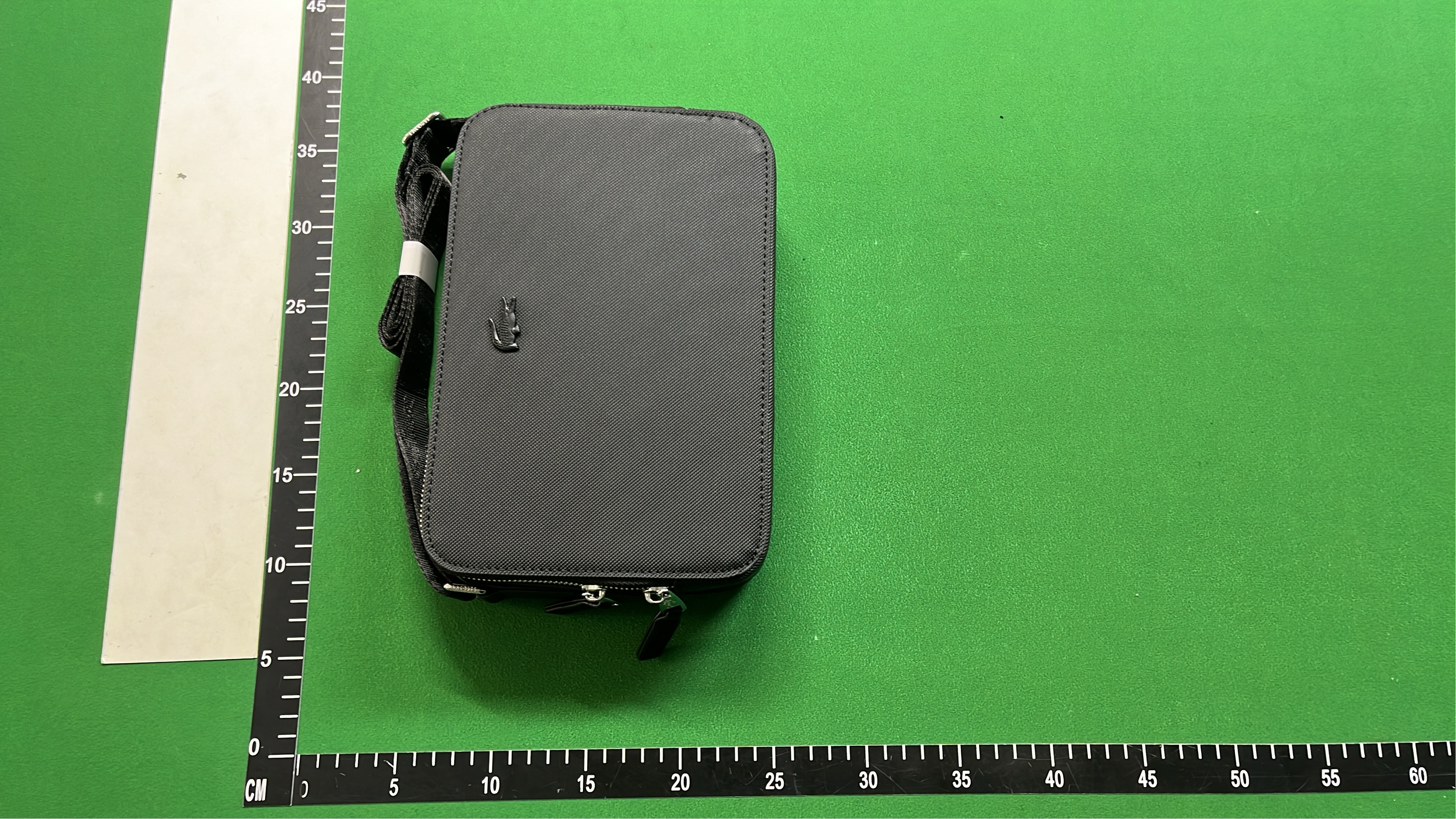 Lacoste Black Crossbody Bag with Zip Closure and Adjustable Strap