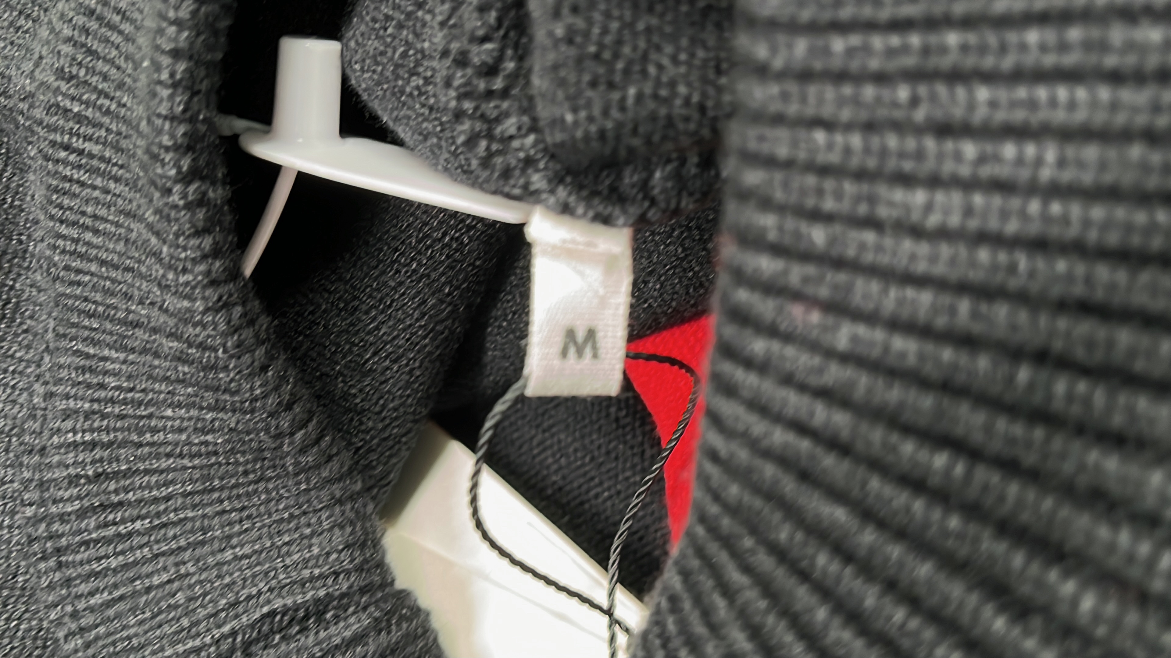 Black Sweater with Red Heart and Letter A Design
