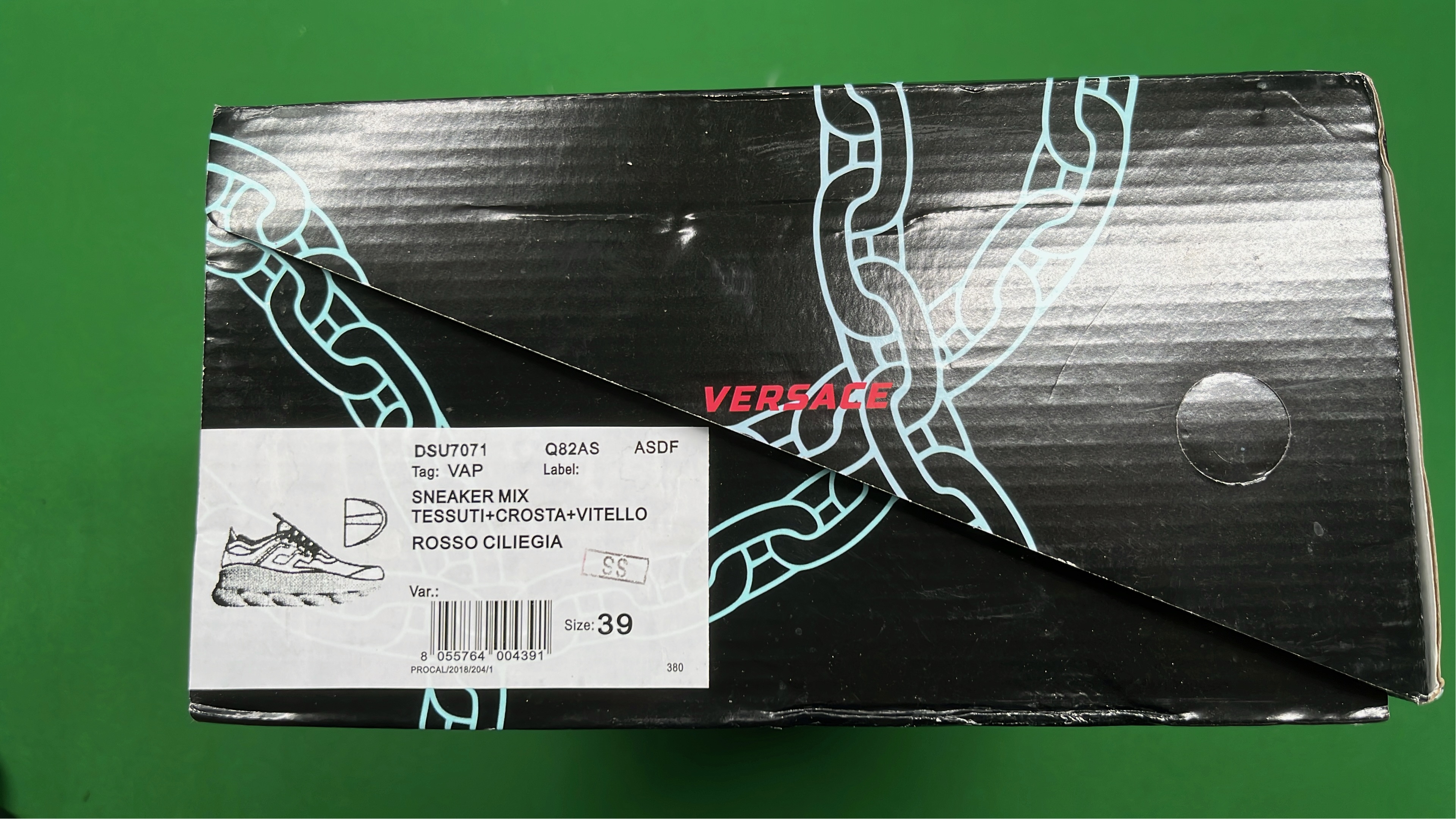 Black Chain Reaction Sneakers with Mesh Design and Bold Logo