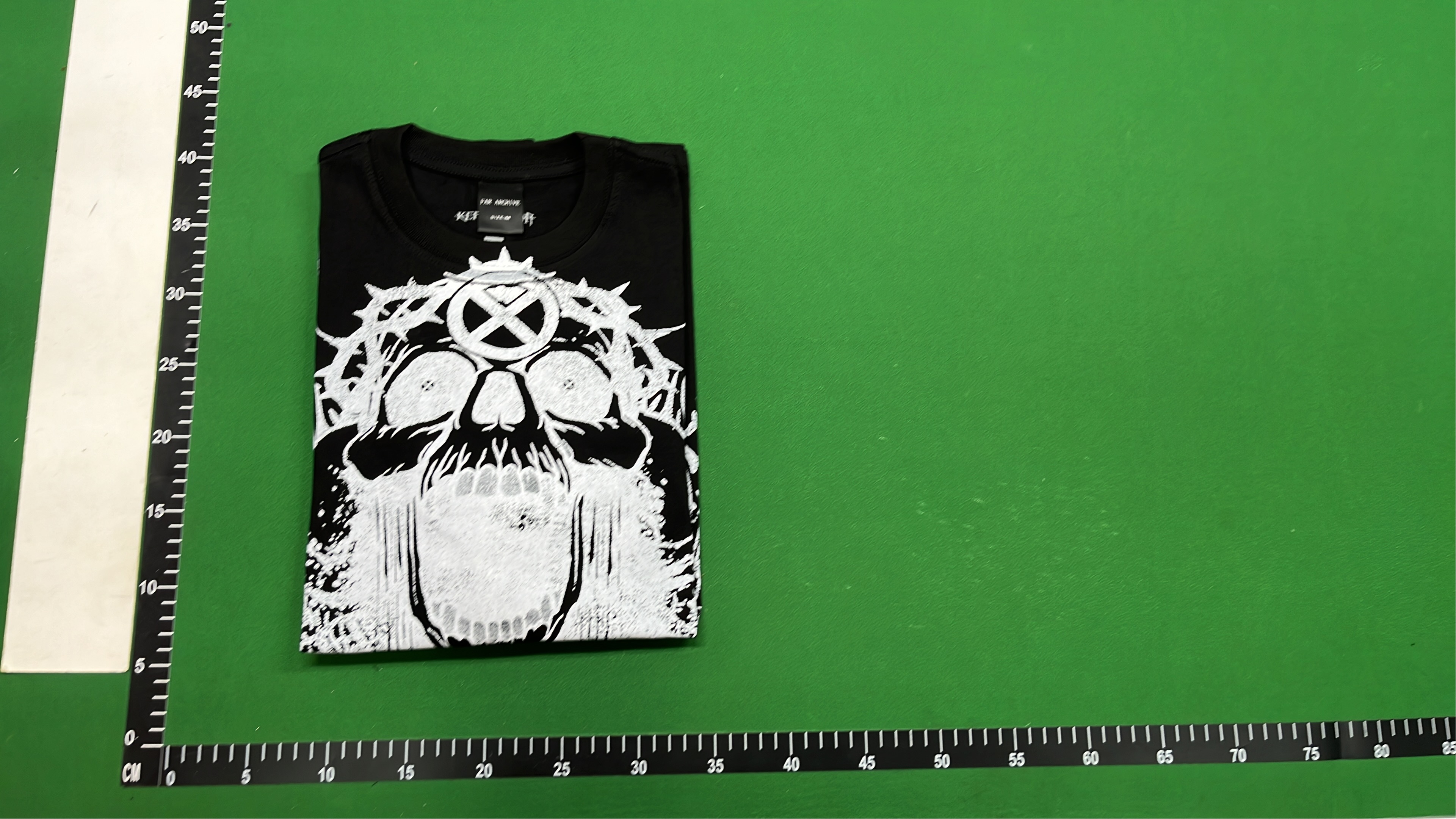 Black T-Shirt with Gothic Skull and Wings Design