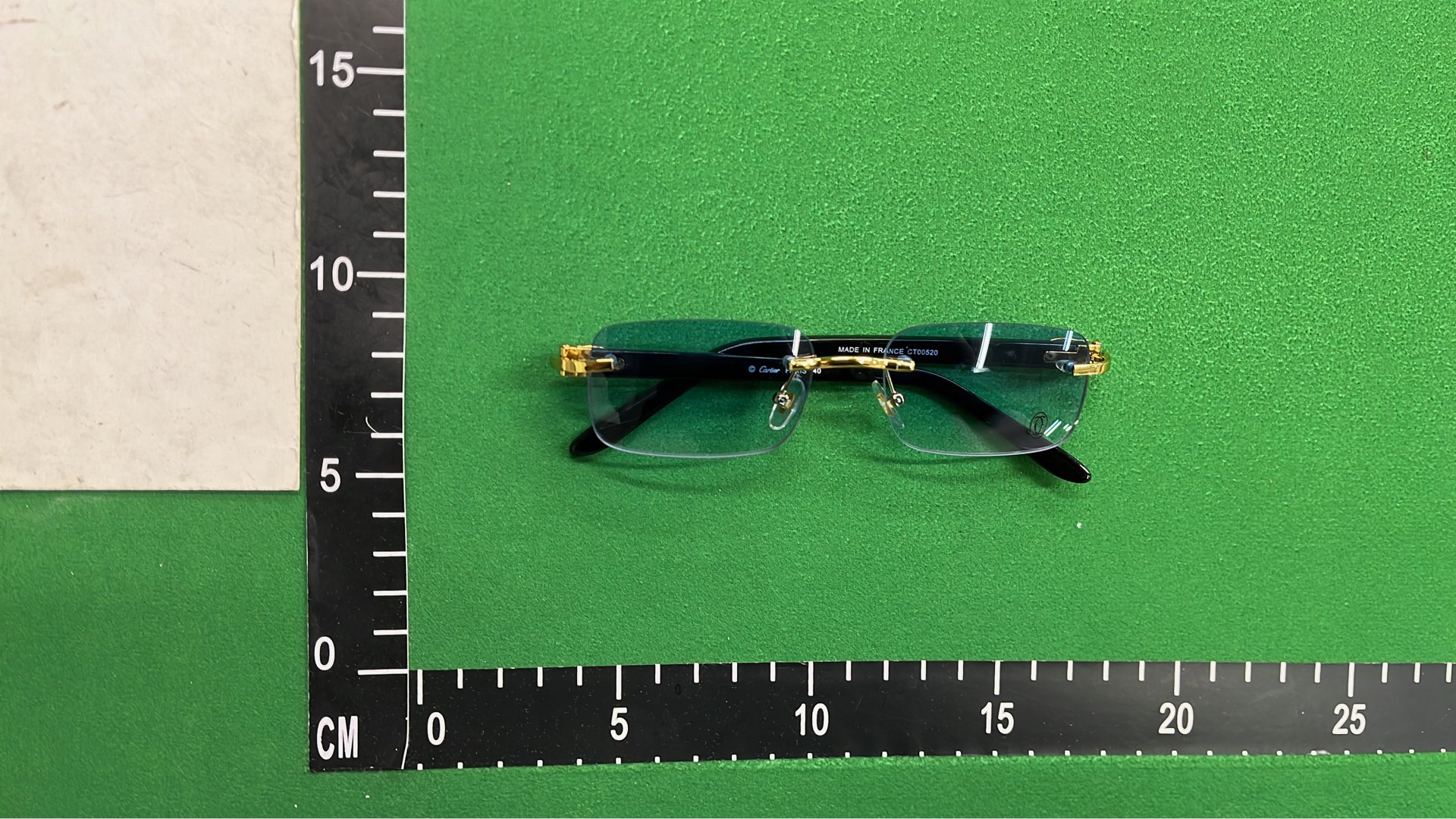 Ray-Ban Rimless Sunglasses with Pink Tint and Gold Accents