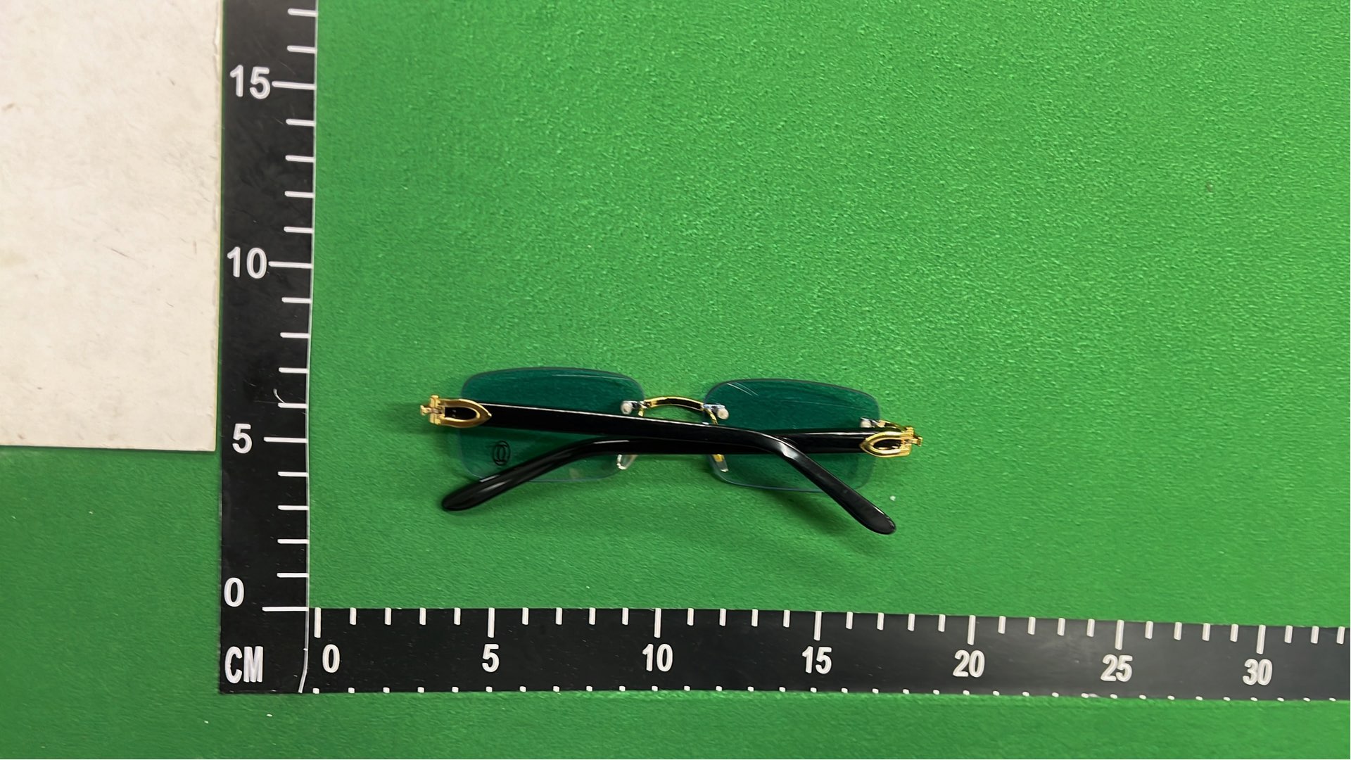 Ray-Ban Rimless Sunglasses with Pink Tint and Gold Accents