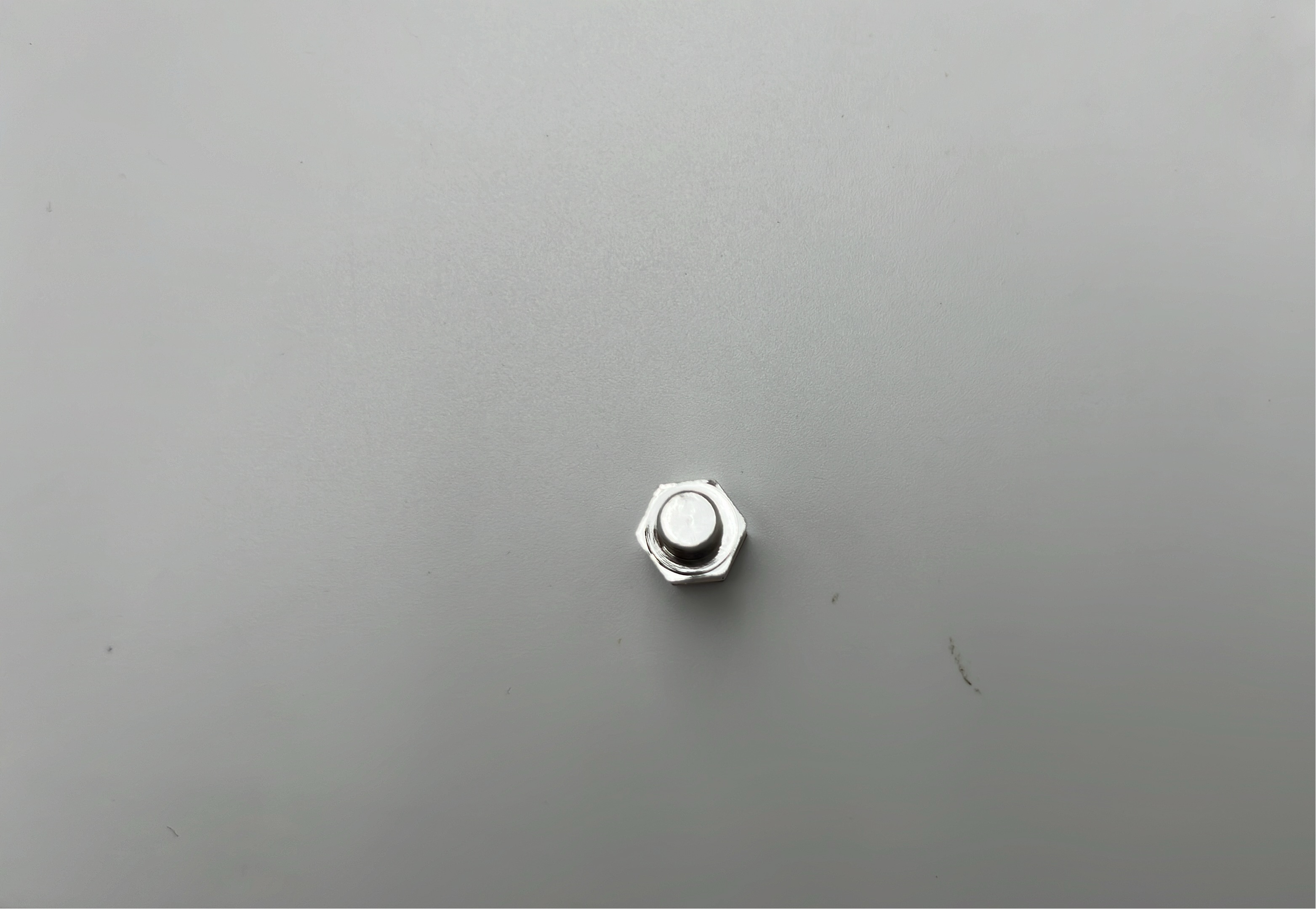 Gold Hexagon Stud Earrings with Orb Logo
